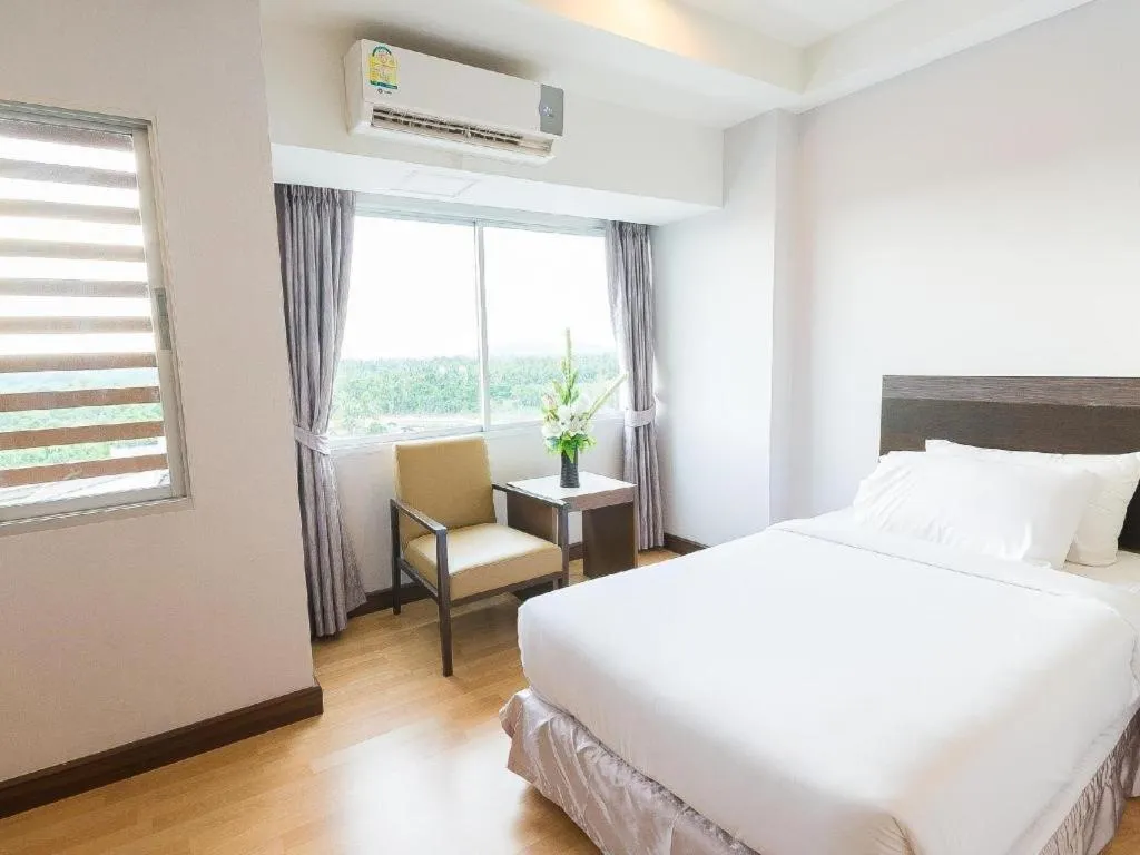 Bed in SinKiat Buri Hotel