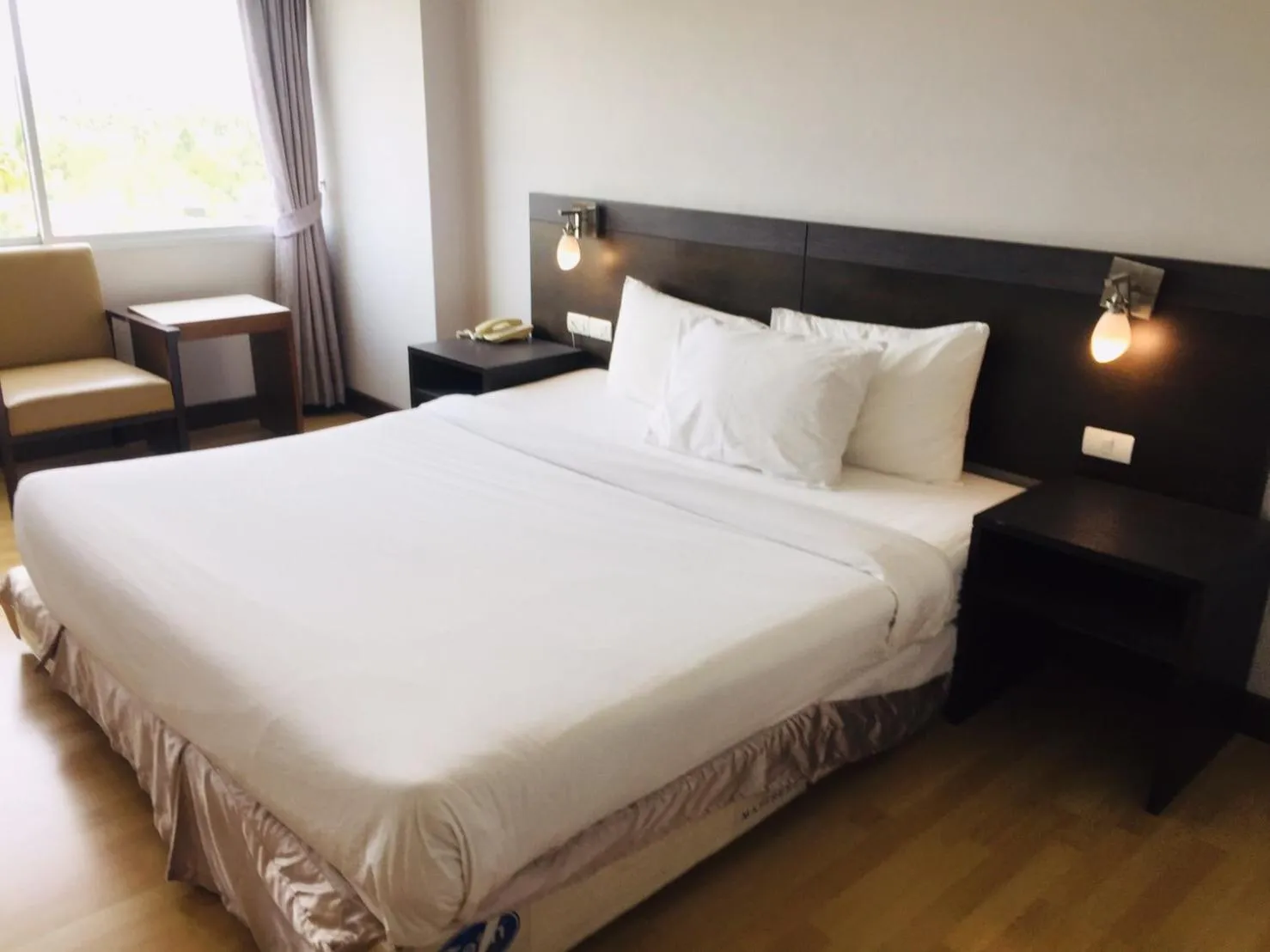 Bed in SinKiat Buri Hotel