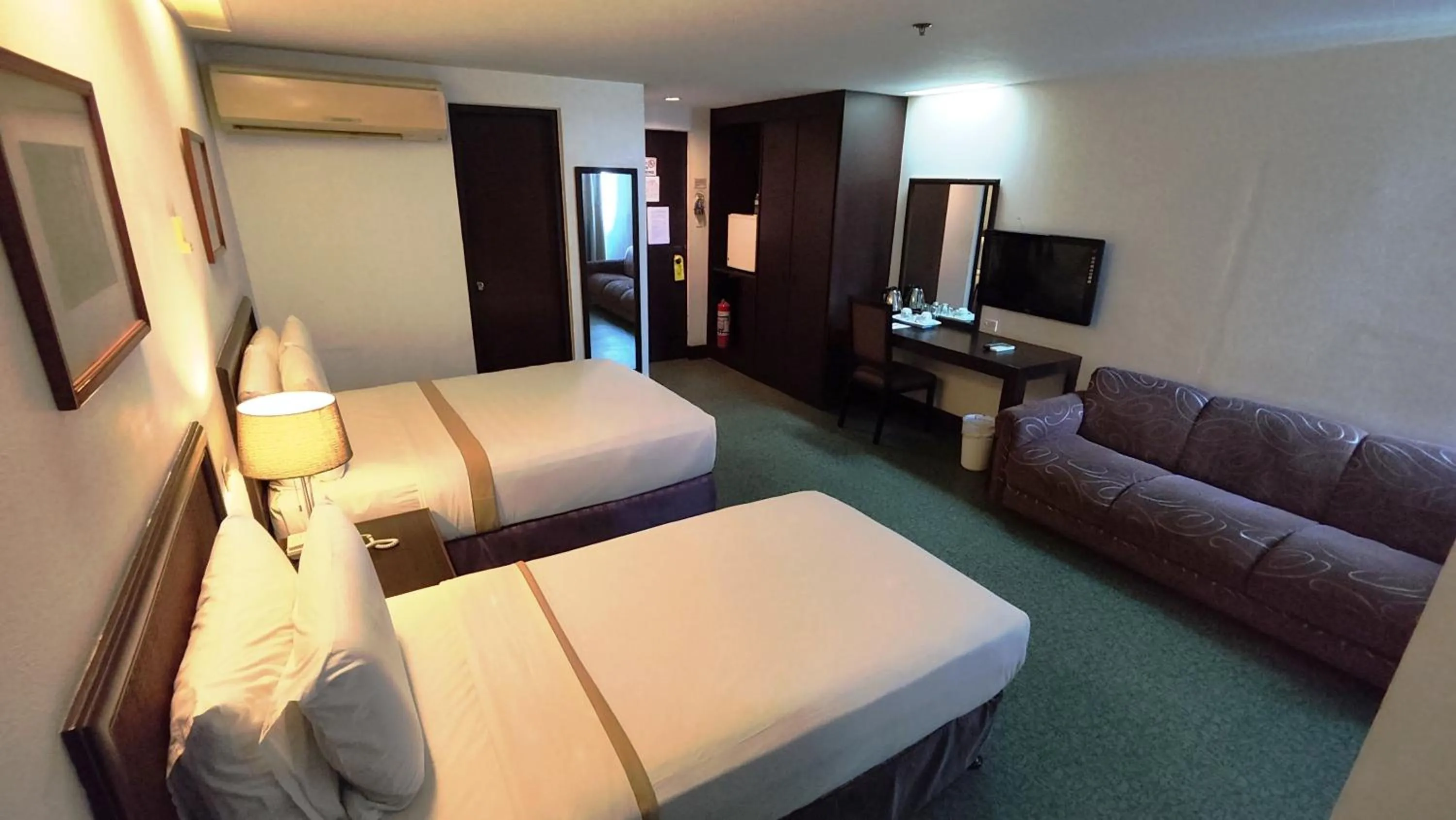 Bed in Rajah Park Hotel by Hiverooms