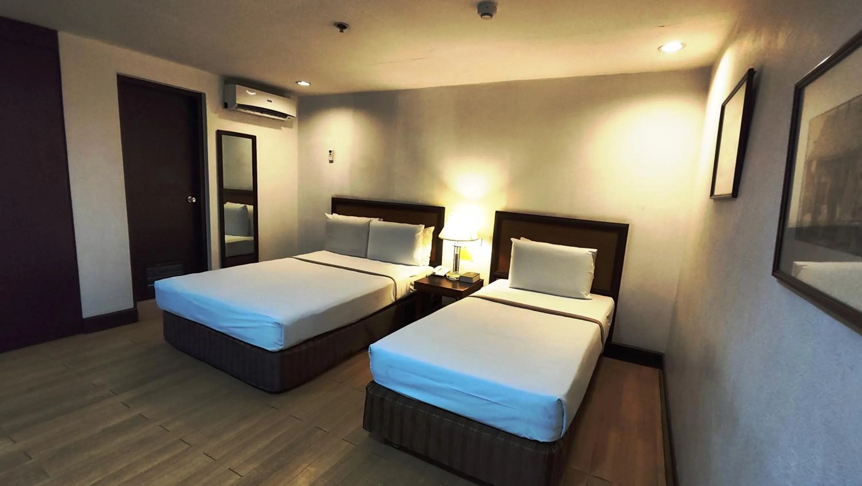 Bed in Rajah Park Hotel by Hiverooms