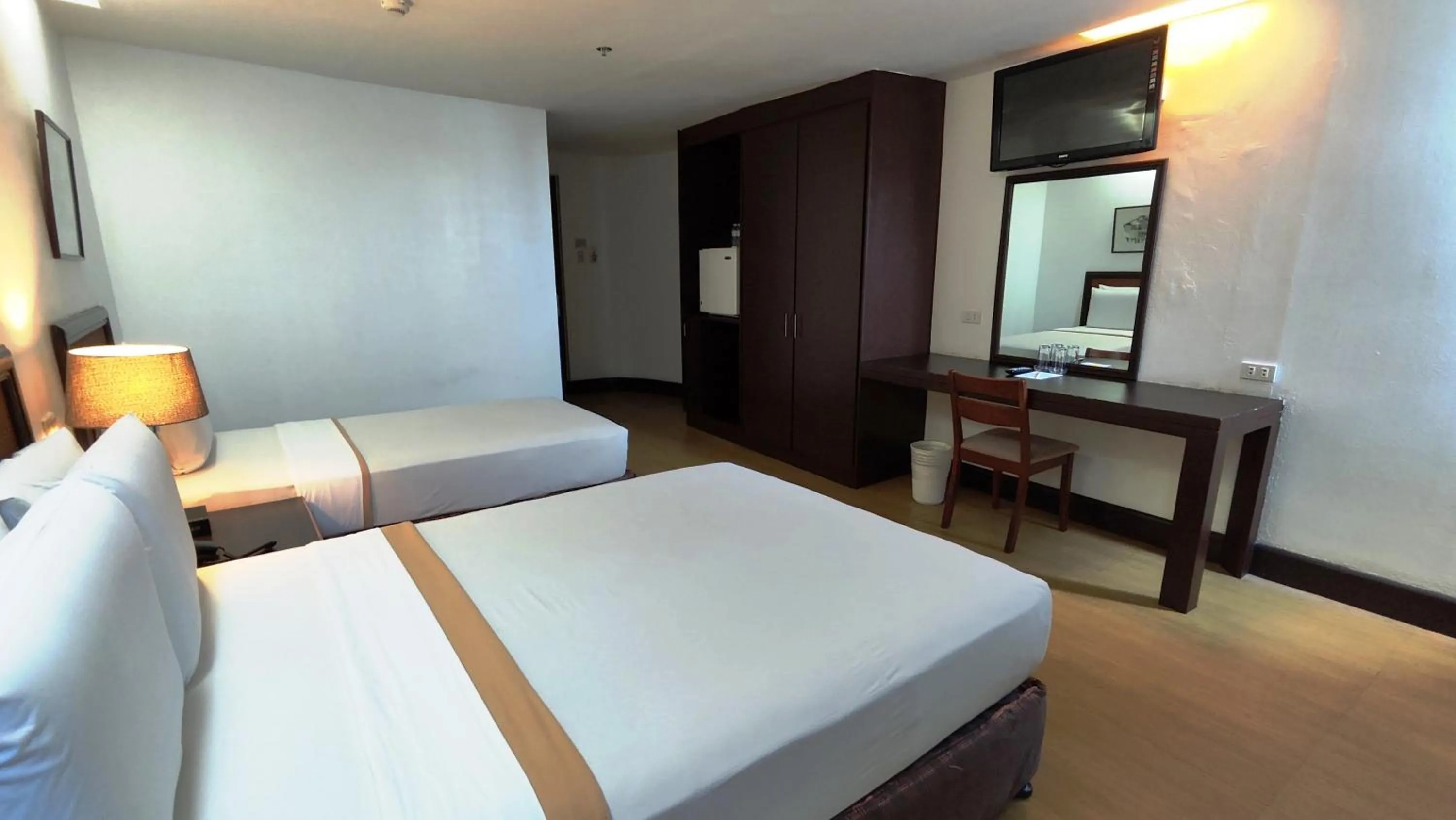 Bed in Rajah Park Hotel by Hiverooms