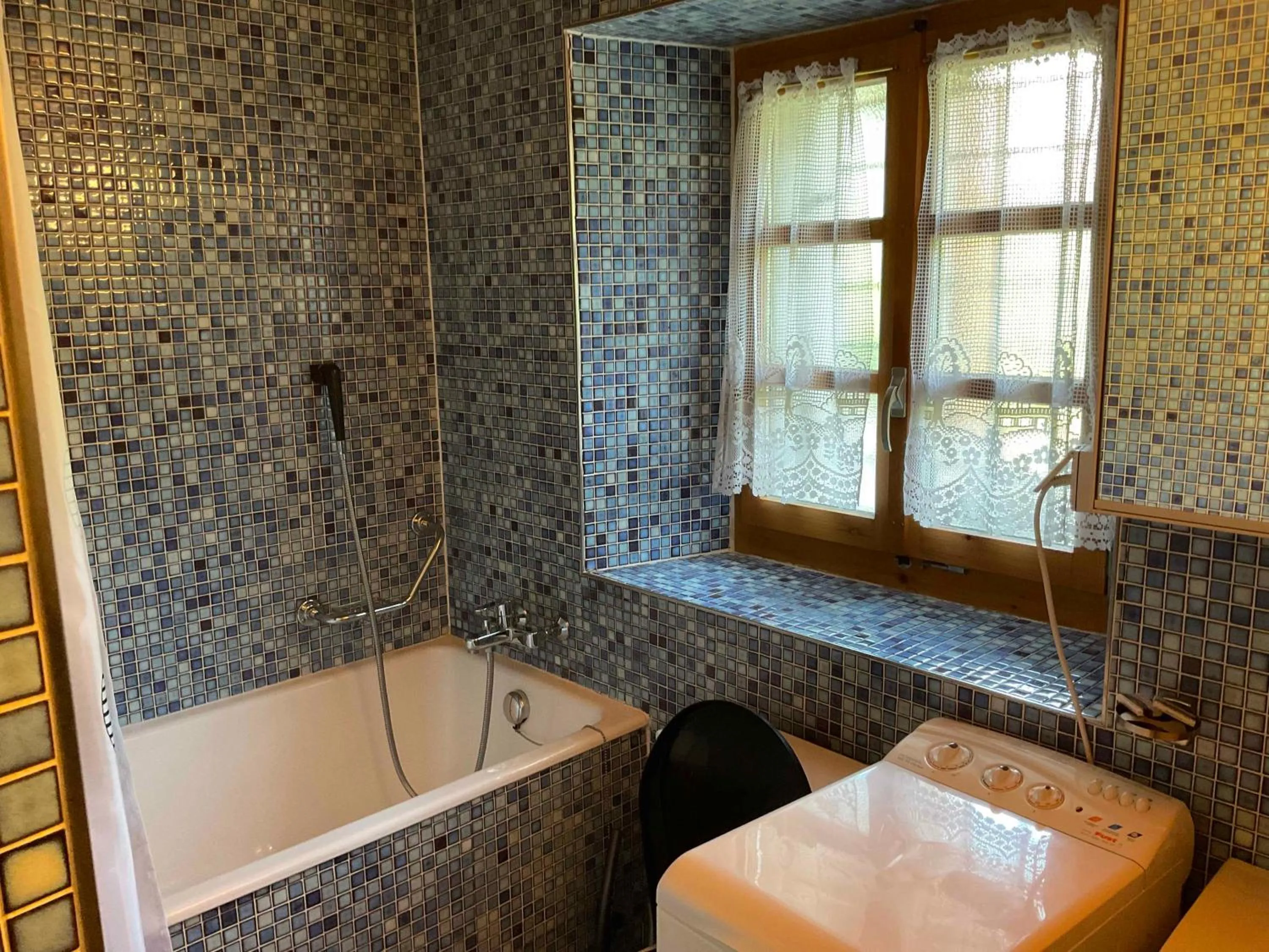 Shower in Hotel les Touristes