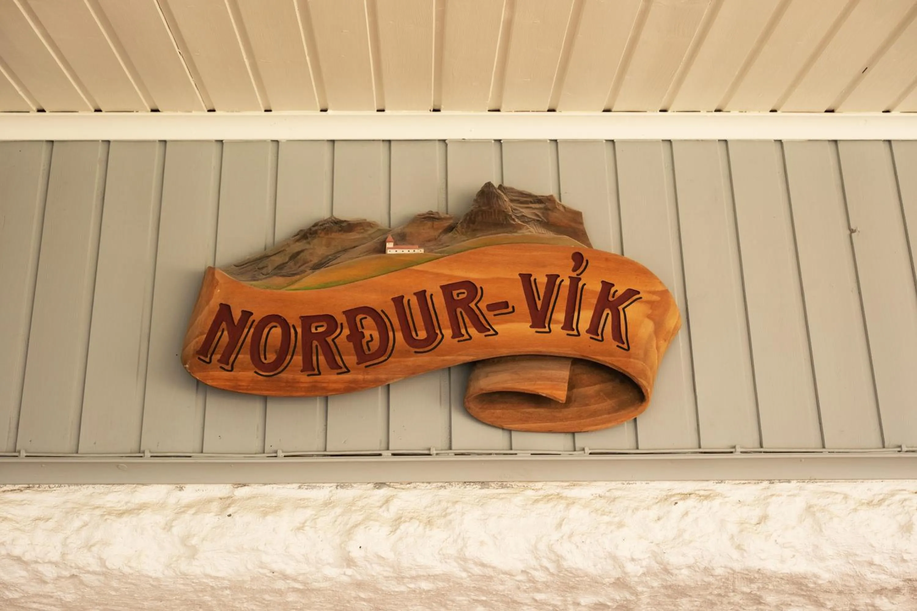 Logo/Certificate/Sign in Vík Hostel