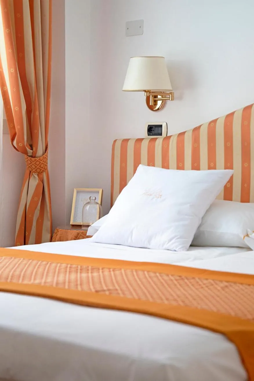 Bed in Hotel Iva