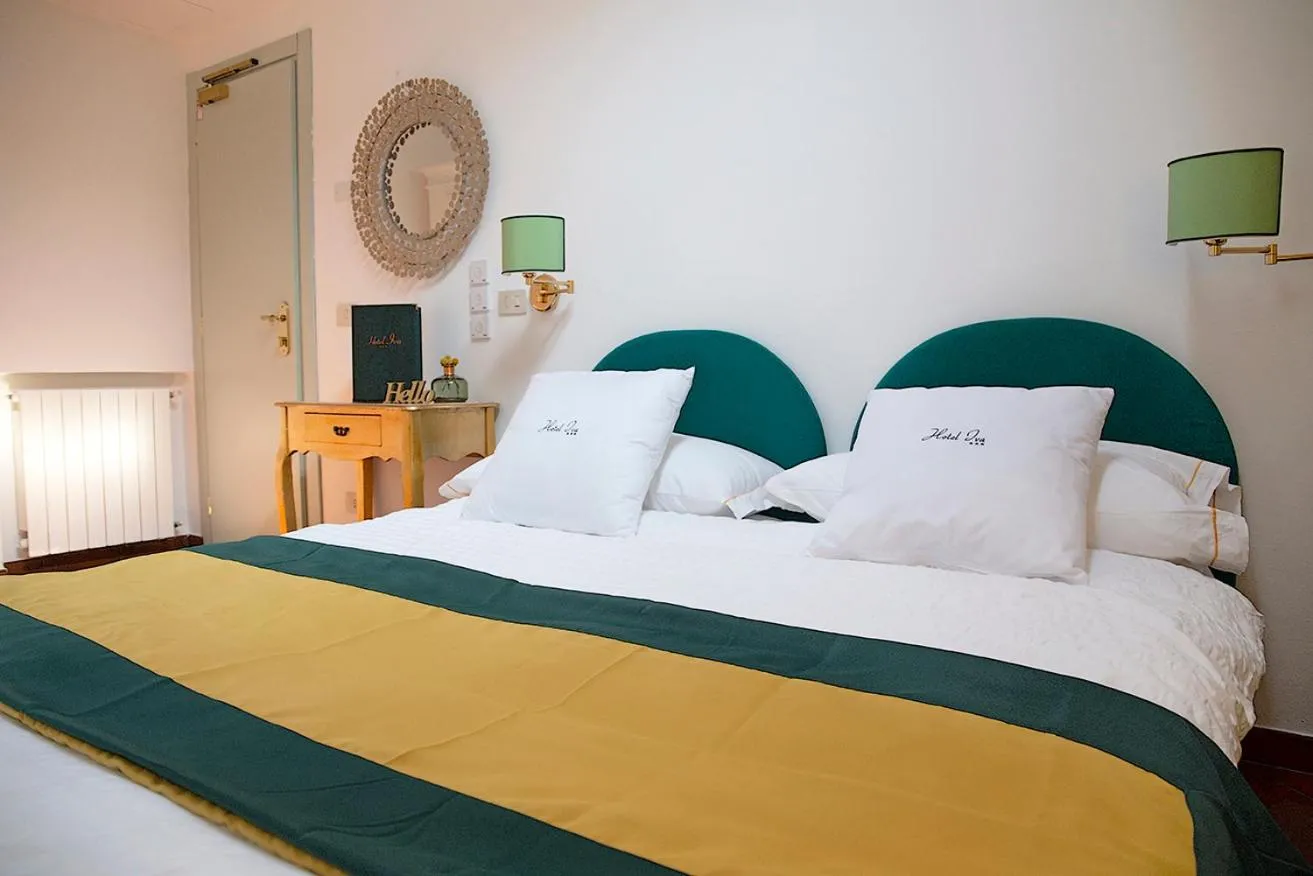 Bed in Hotel Iva