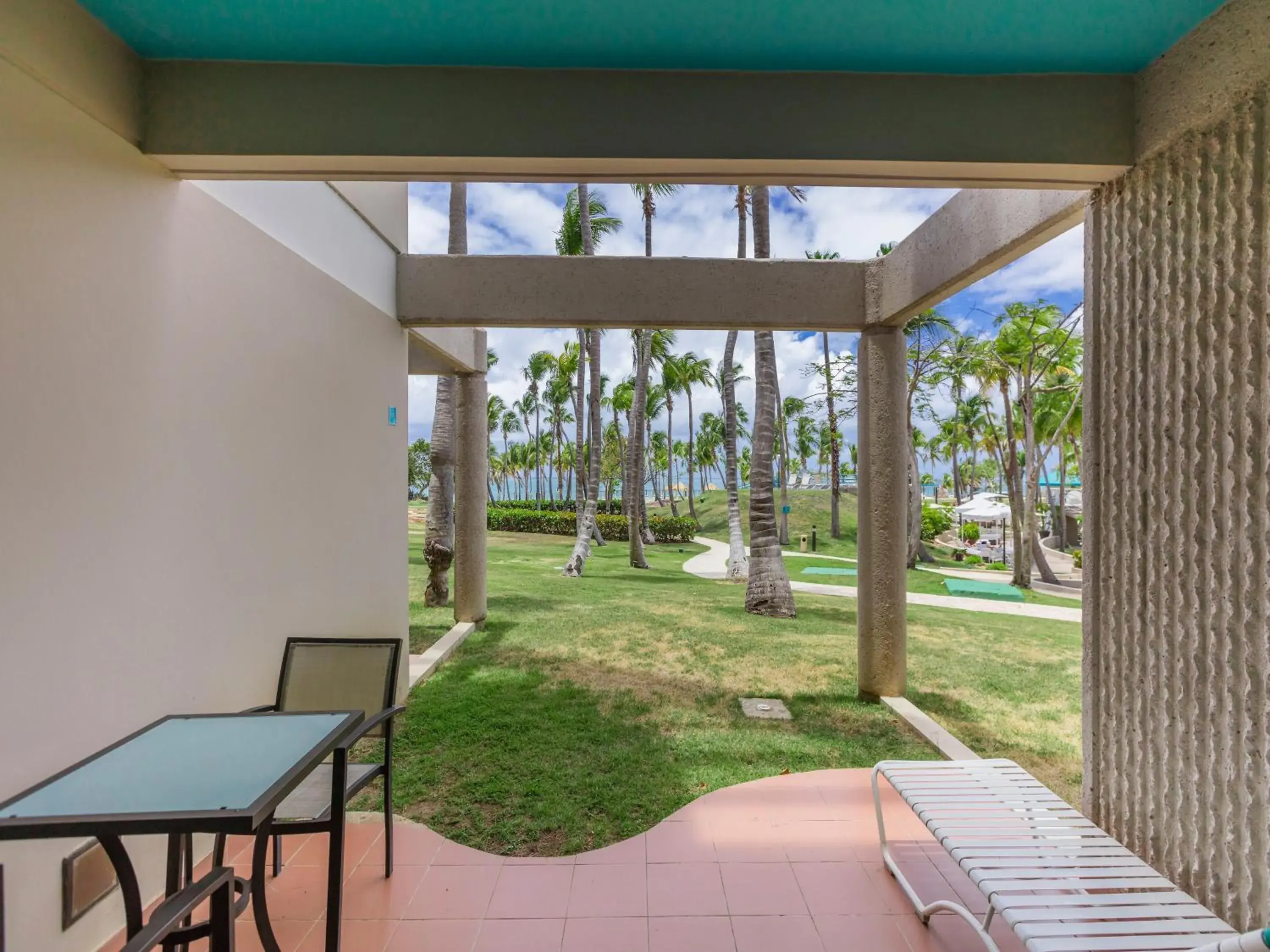 King Room with Pool/Ocean View and Patio Access in Hilton Ponce Golf & Casino Resort King Room with Pool/Ocean View and Patio Access in Hilton Ponce Golf & Casino Resort