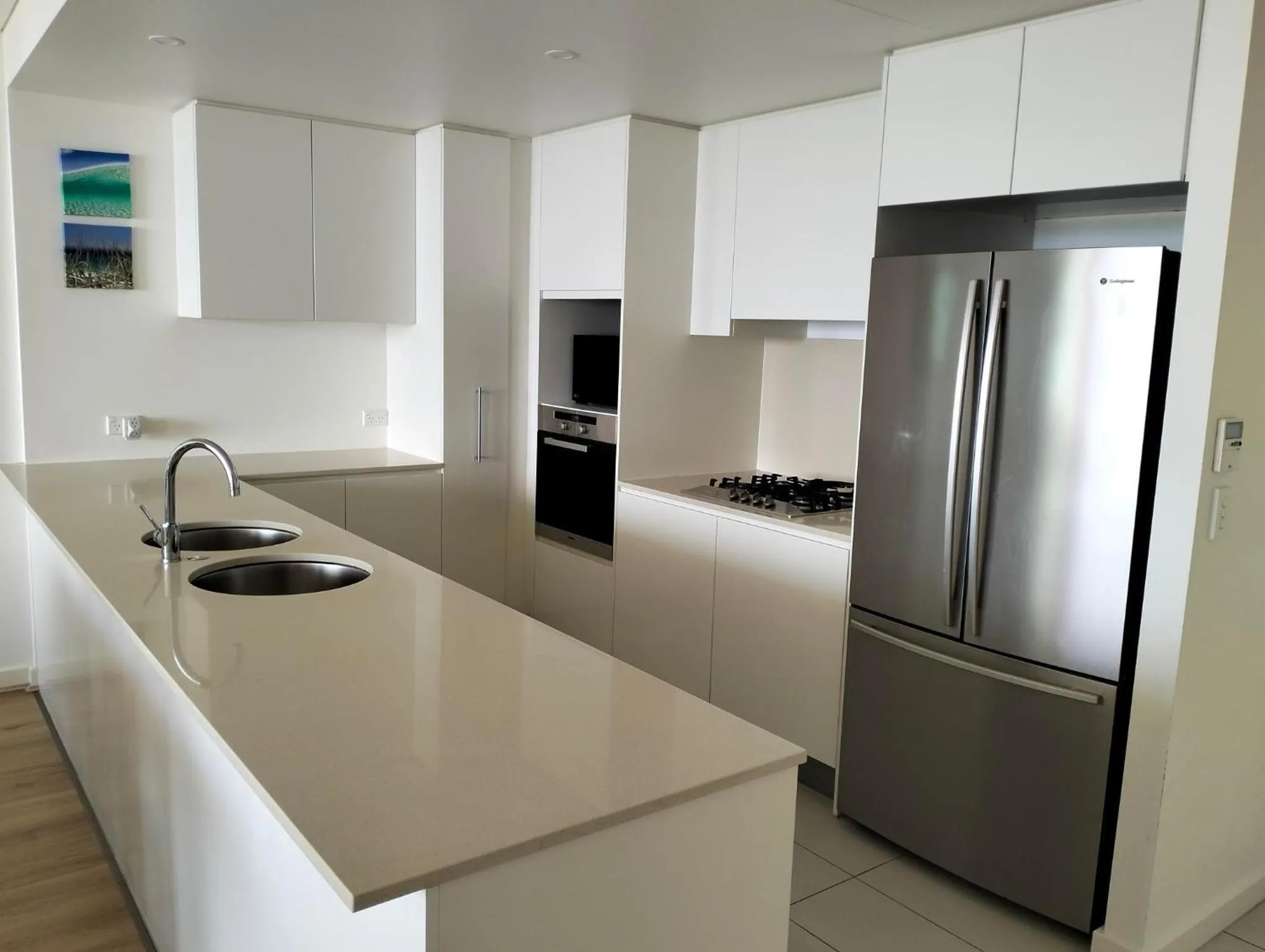 Kitchen or kitchenette in Kirra Surf Apartments