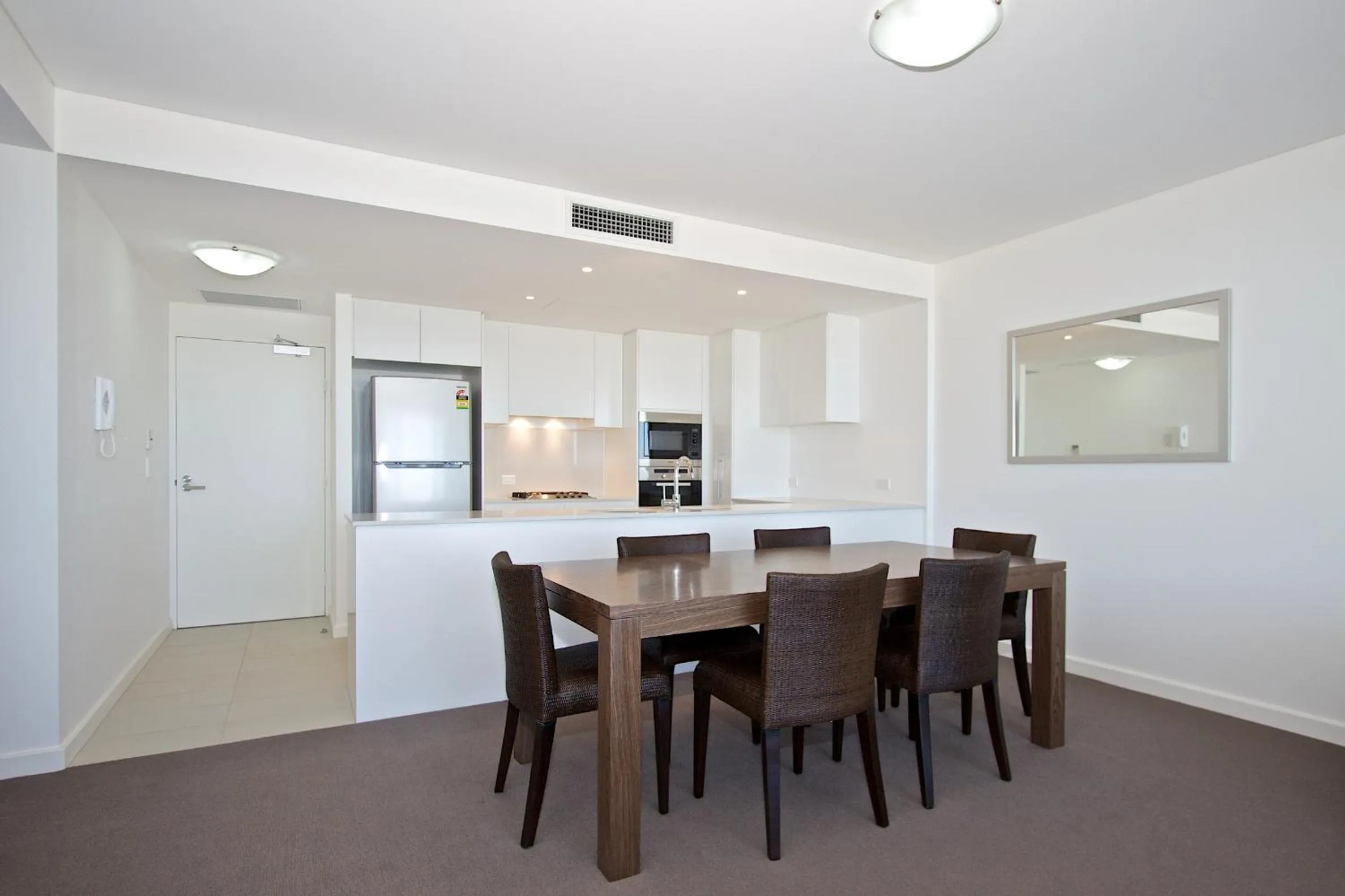 Kitchen or kitchenette in Kirra Surf Apartments