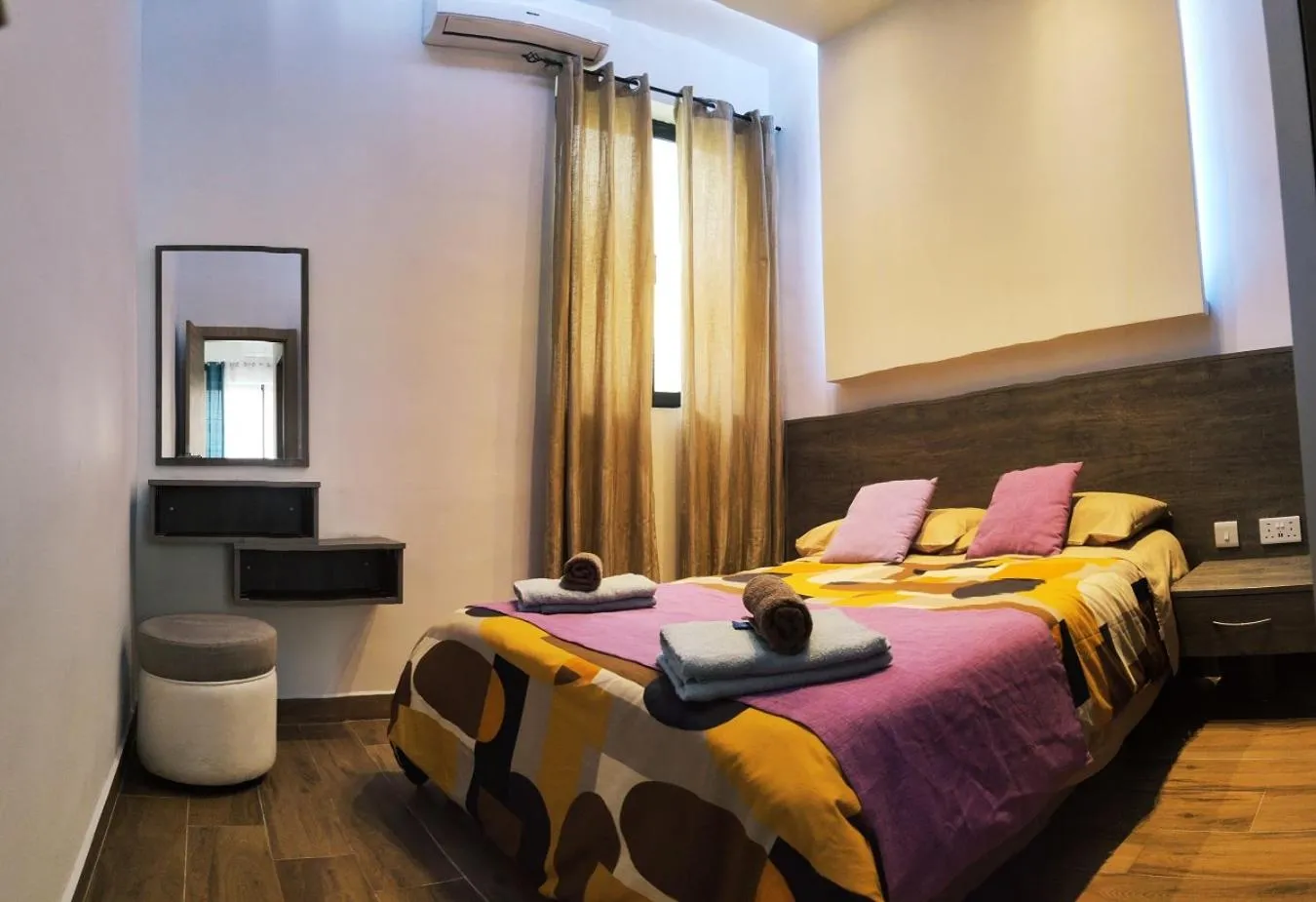 Bed in Diamonds Luxury Apartments