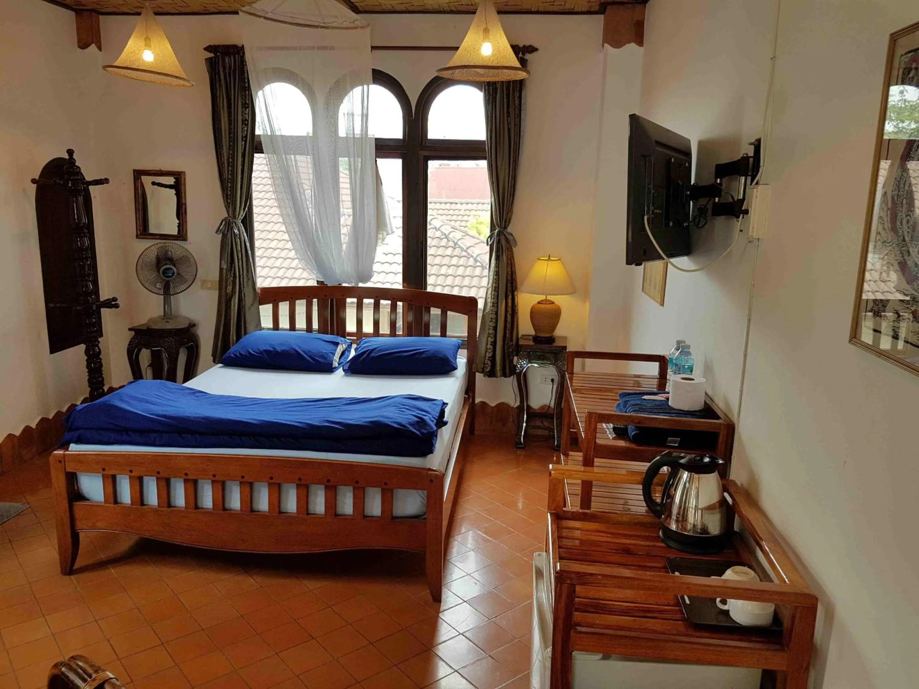 Bed in Mut Mee Garden Guest House