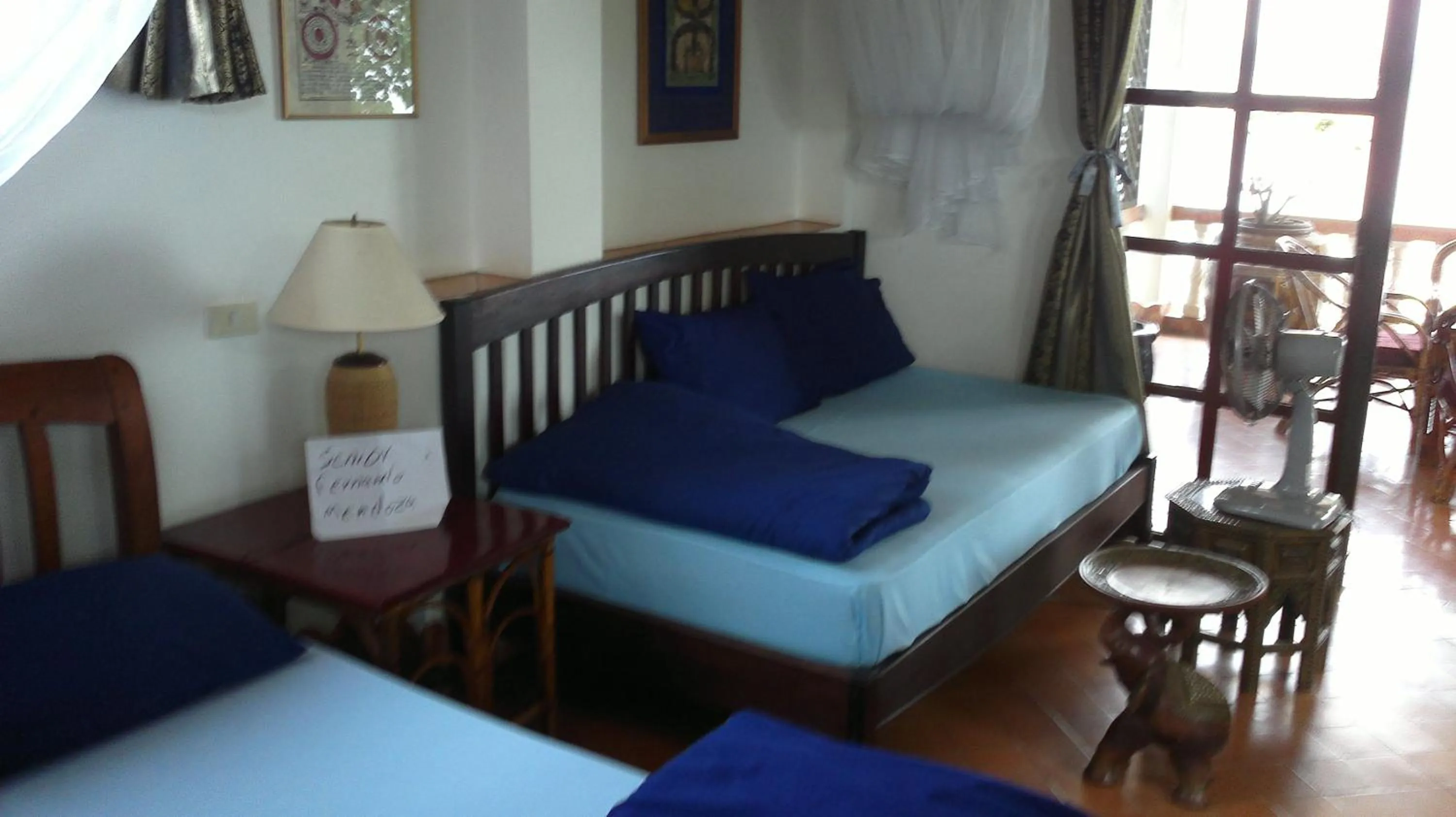 Bed in Mut Mee Garden Guest House