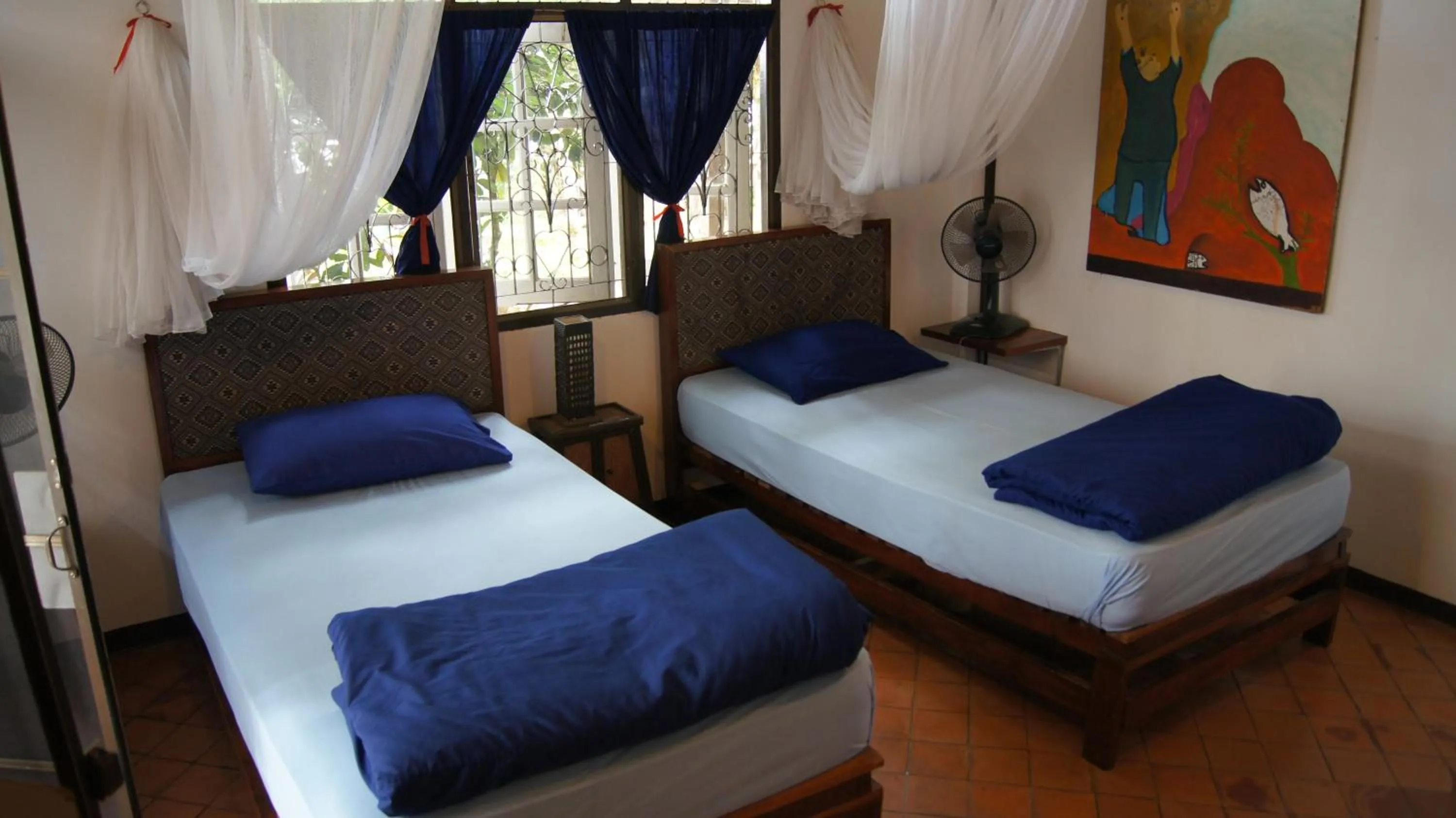 Photo of the whole room, Bed in Mut Mee Garden Guest House