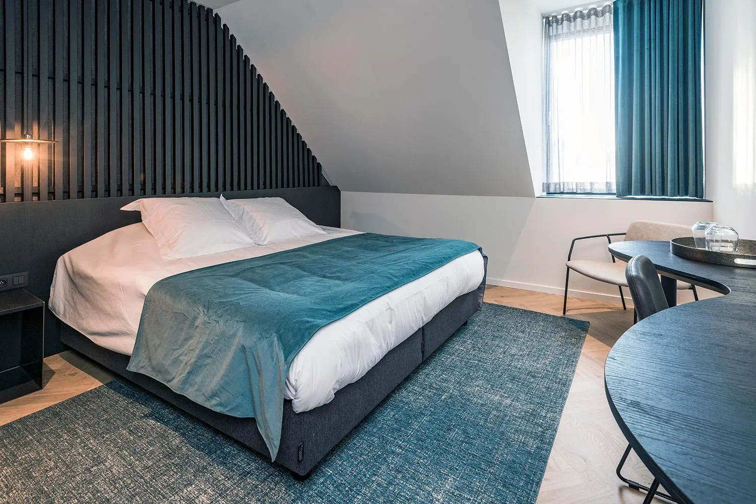 Bed in Designhotel Beila