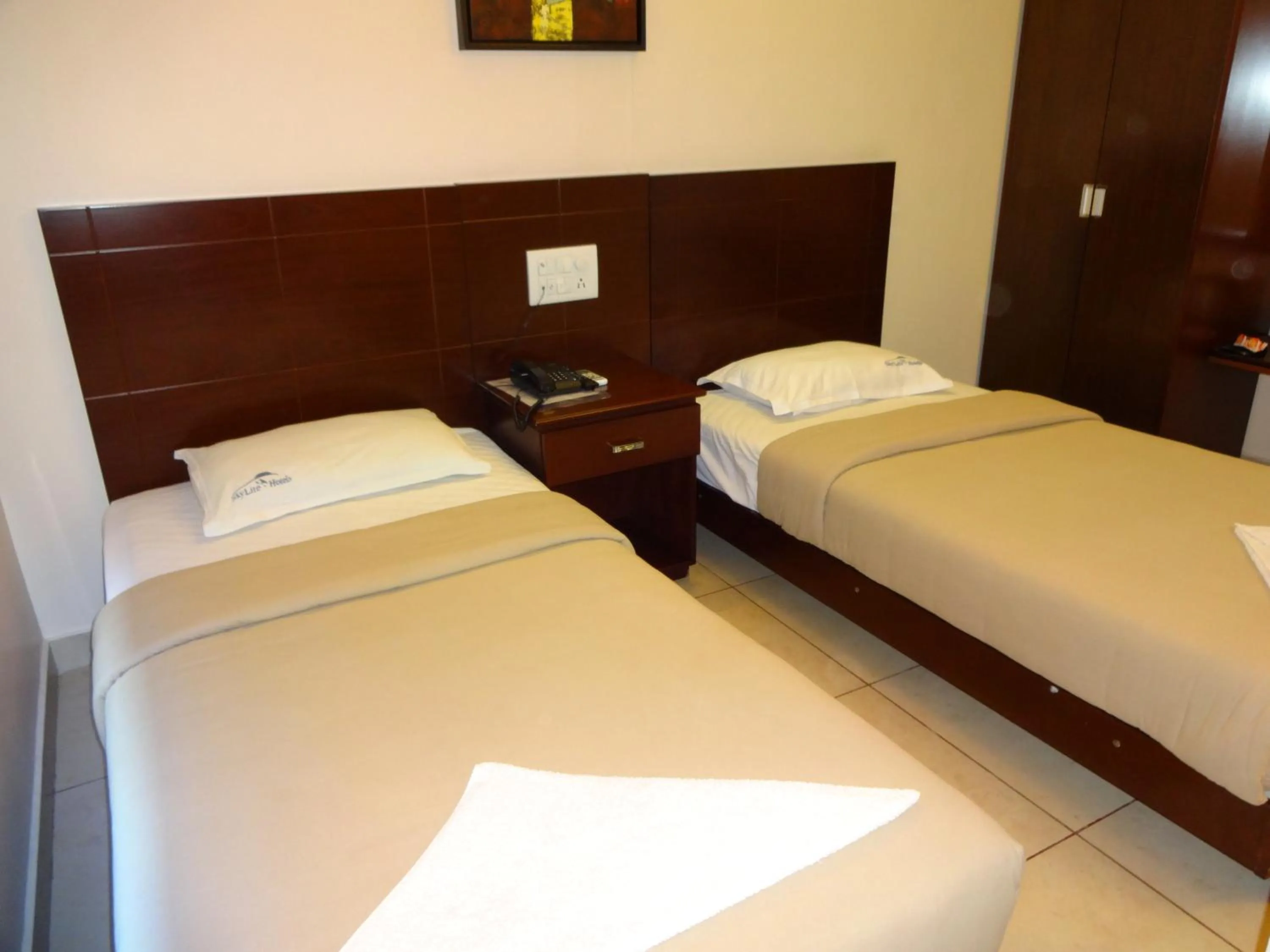 Photo of the whole room, Bed in Hotel Sky Lite