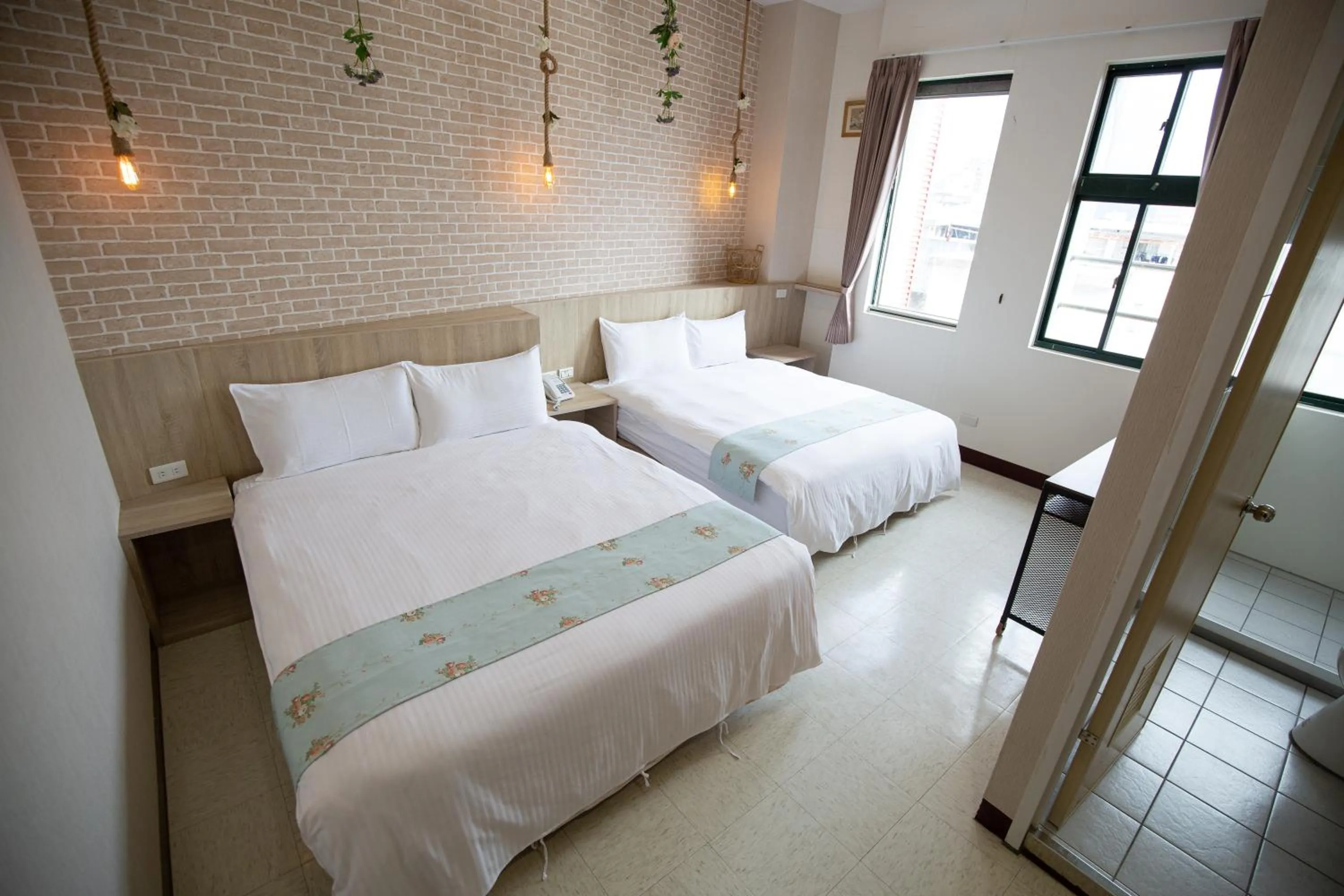 Bed in Jia-Jia Business Hotel
