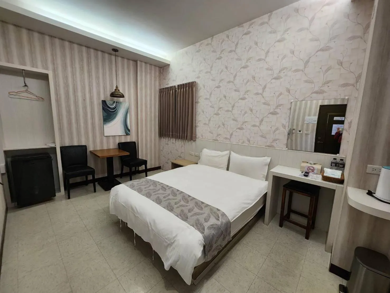 Bed in Jia-Jia Business Hotel