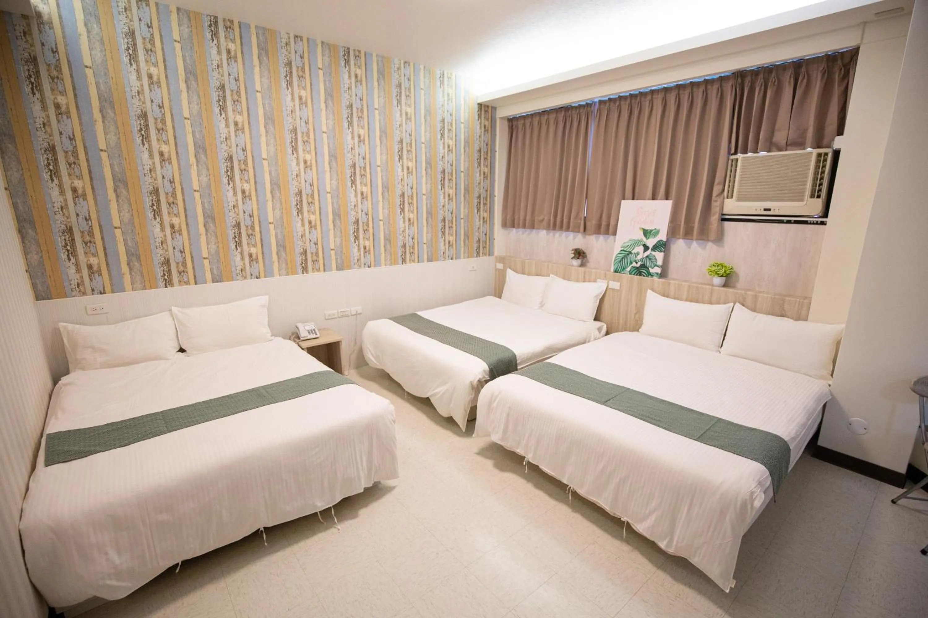 Bed in Jia-Jia Business Hotel