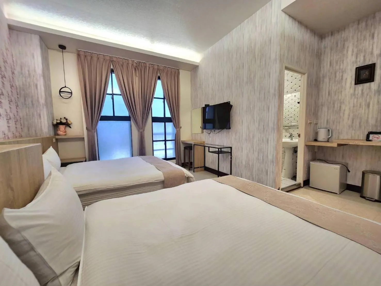 Bed in Jia-Jia Business Hotel