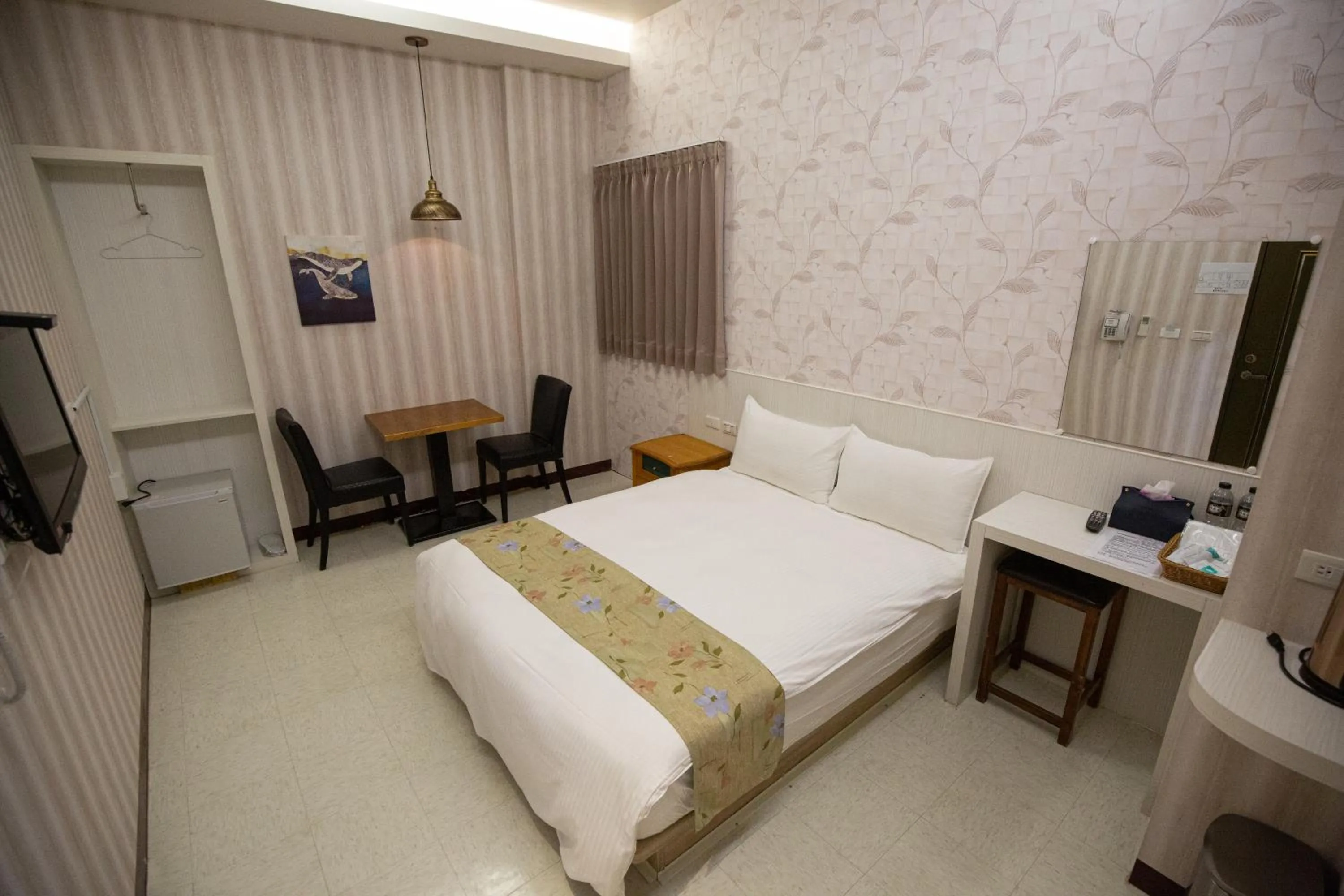 Bed in Jia-Jia Business Hotel