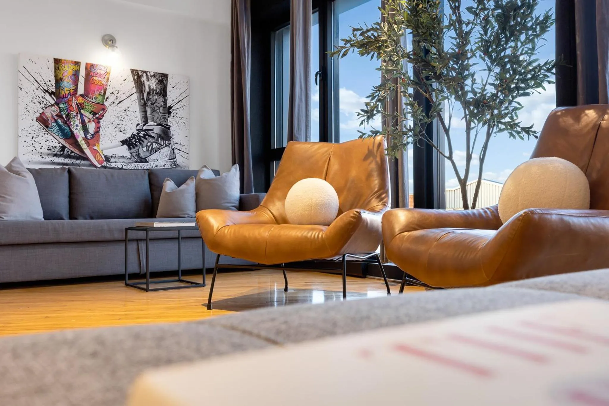 Living room in LiV MTL Plaza