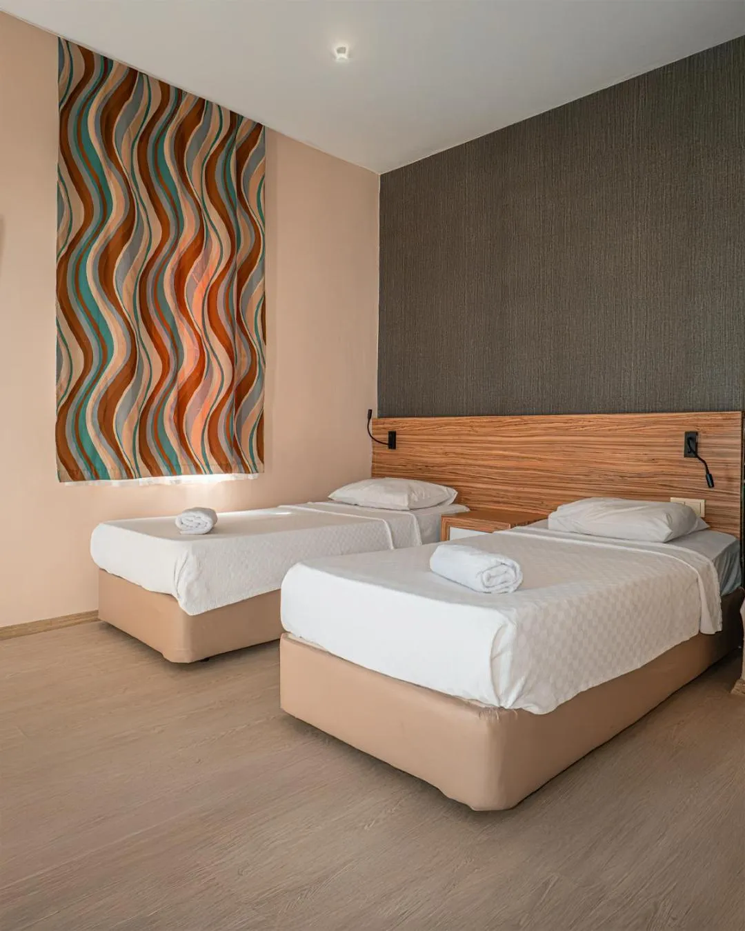 Bed in Yucesan Hotel