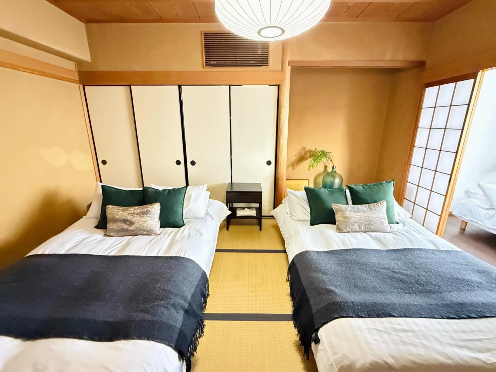 Bed in Crest Daikoku Owner's room -vacation rental-