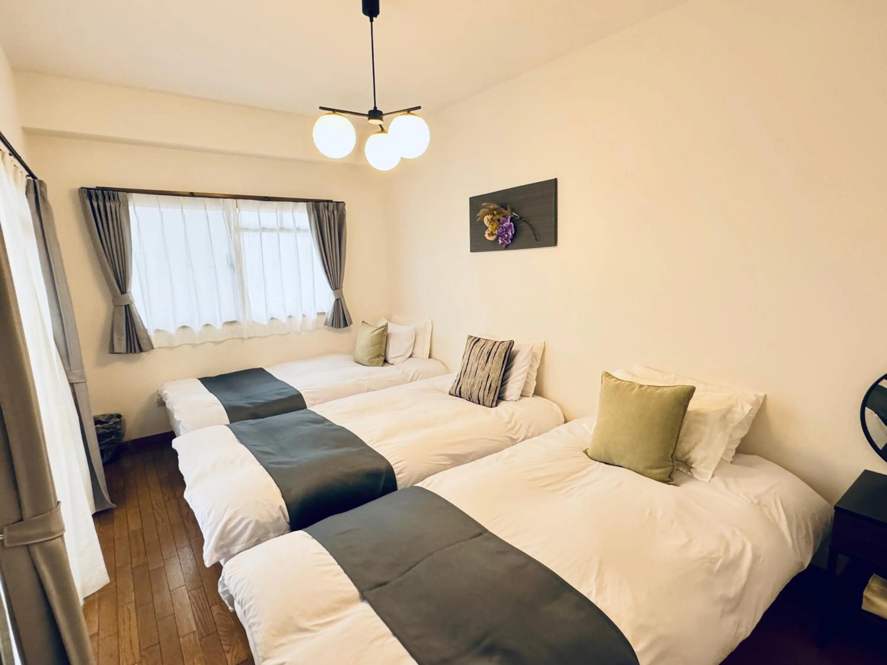 Bed in Crest Daikoku Owner's room -vacation rental-