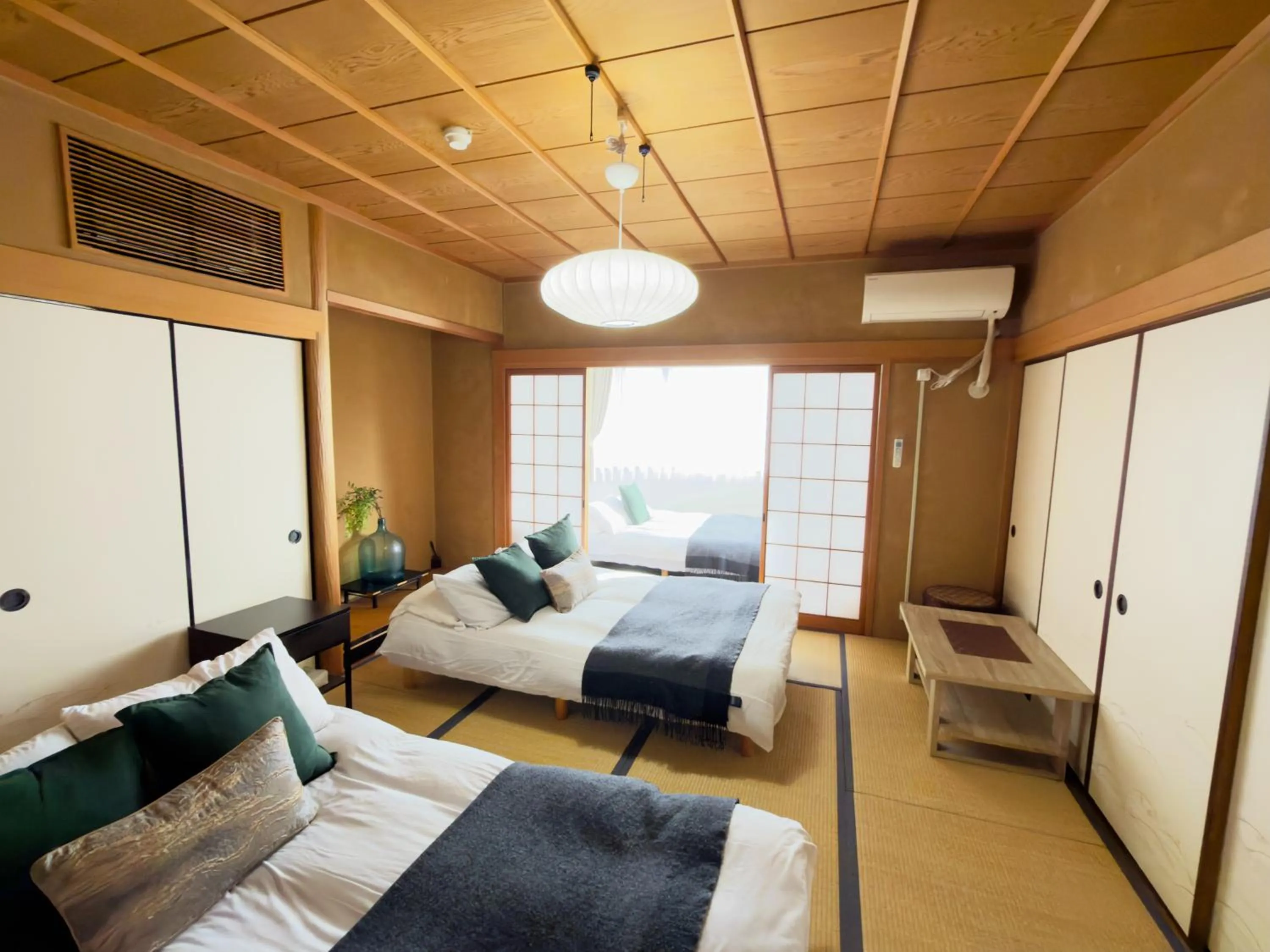Bed in Crest Daikoku Owner's room -vacation rental-