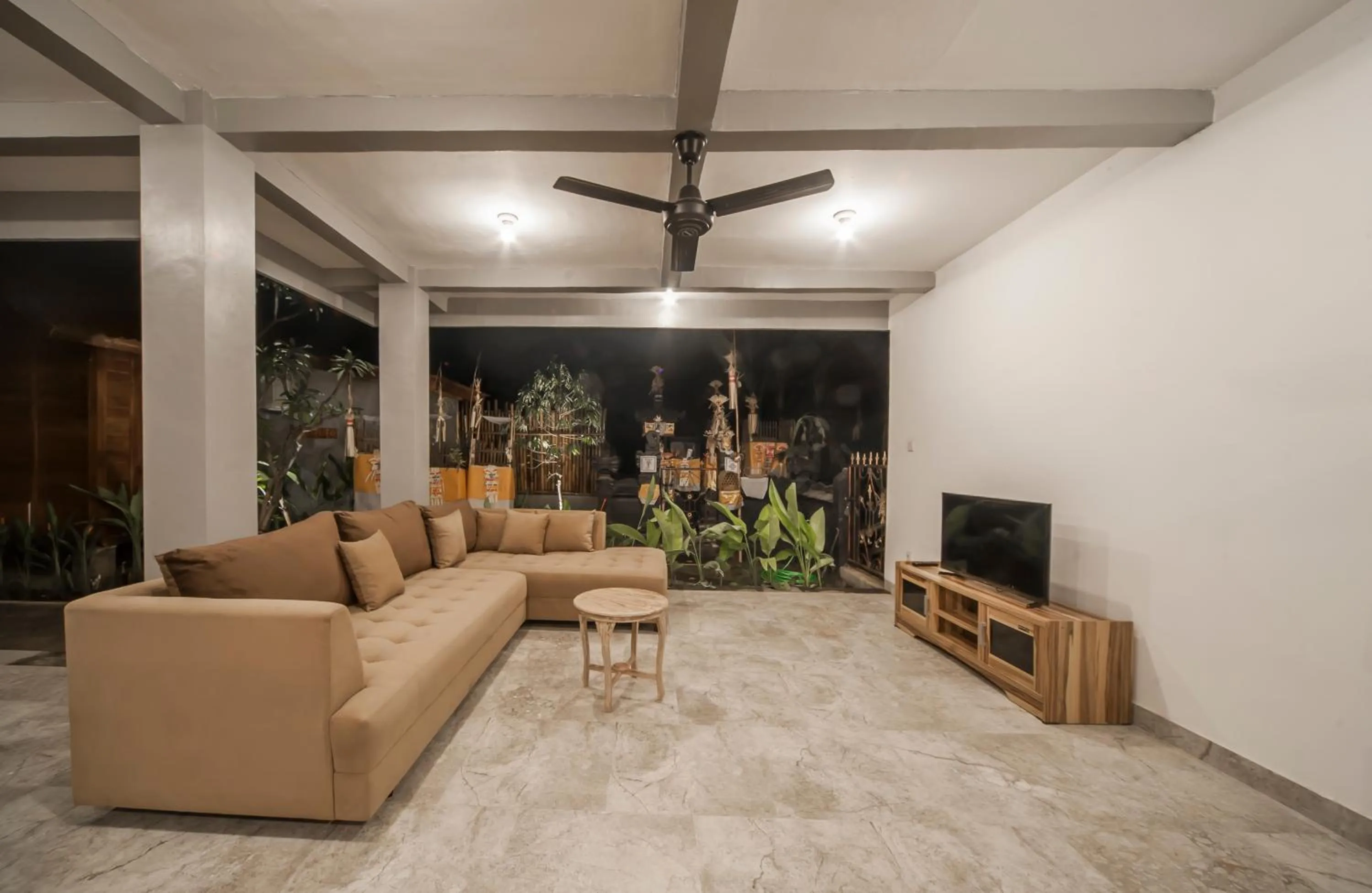 Communal lounge/ TV room in The Lebak Canggu