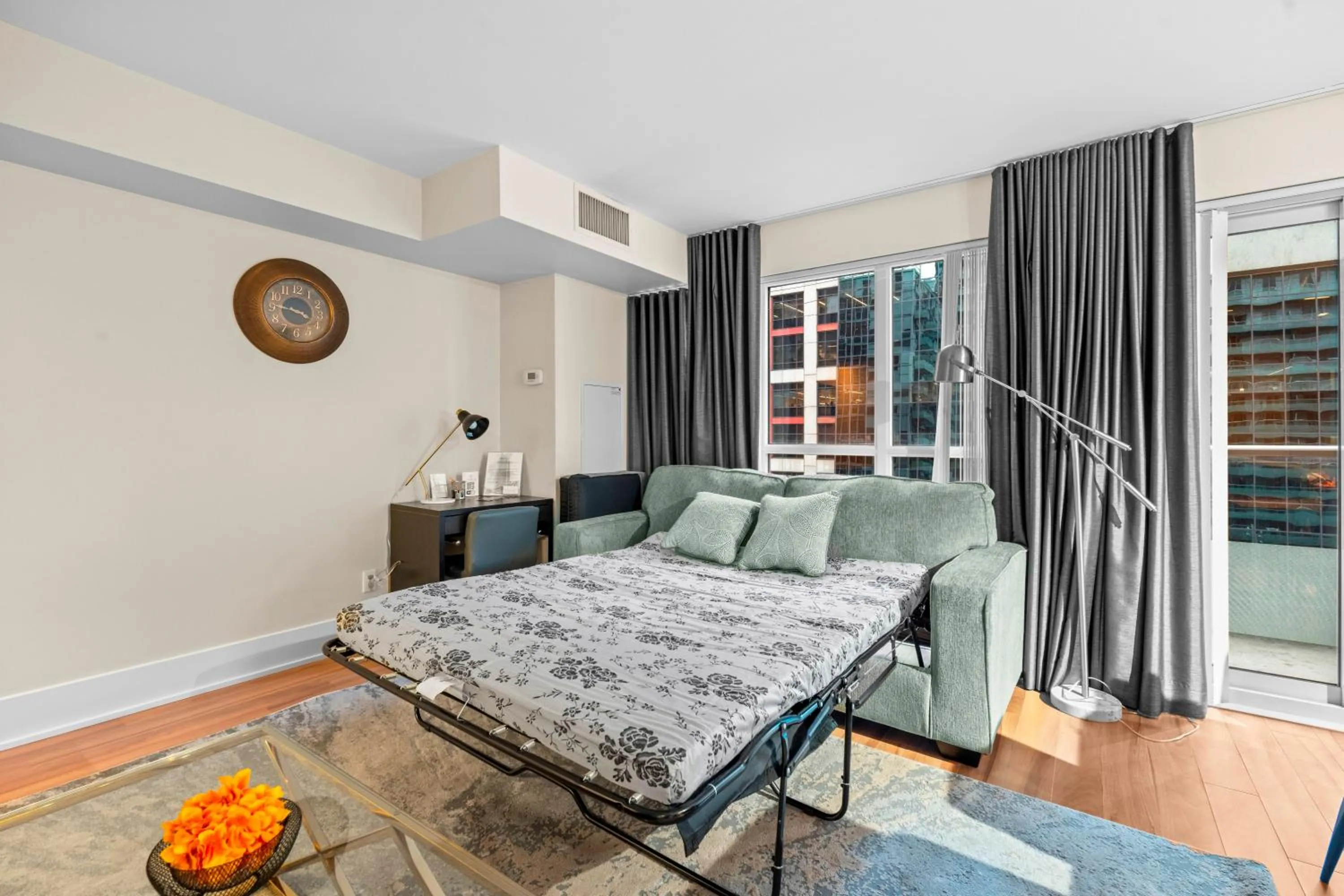 Living room, Bed in GLOBALSTAY Modern Downtown Apartment