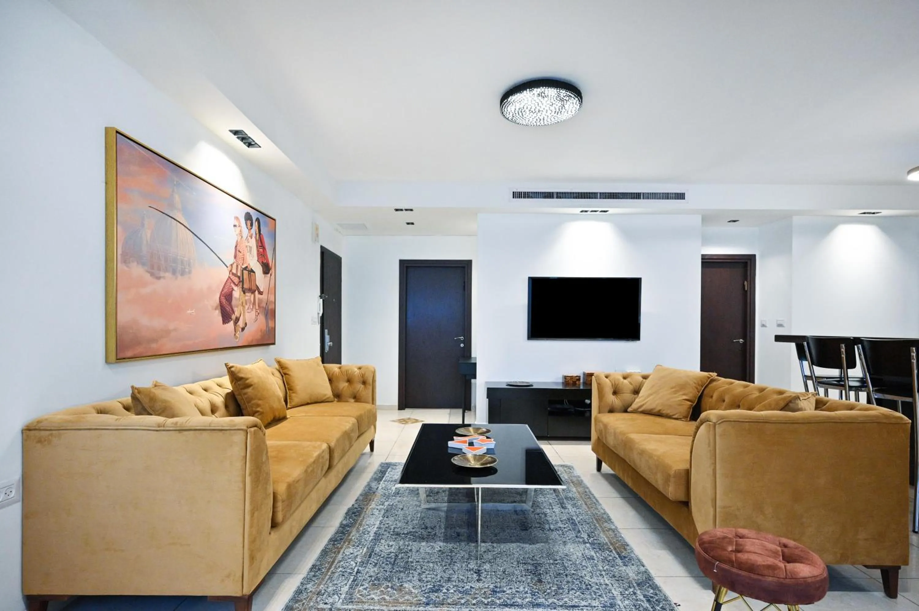 TV and multimedia in Cozy 2BR in Ben Gurion blvd by HolyGuest