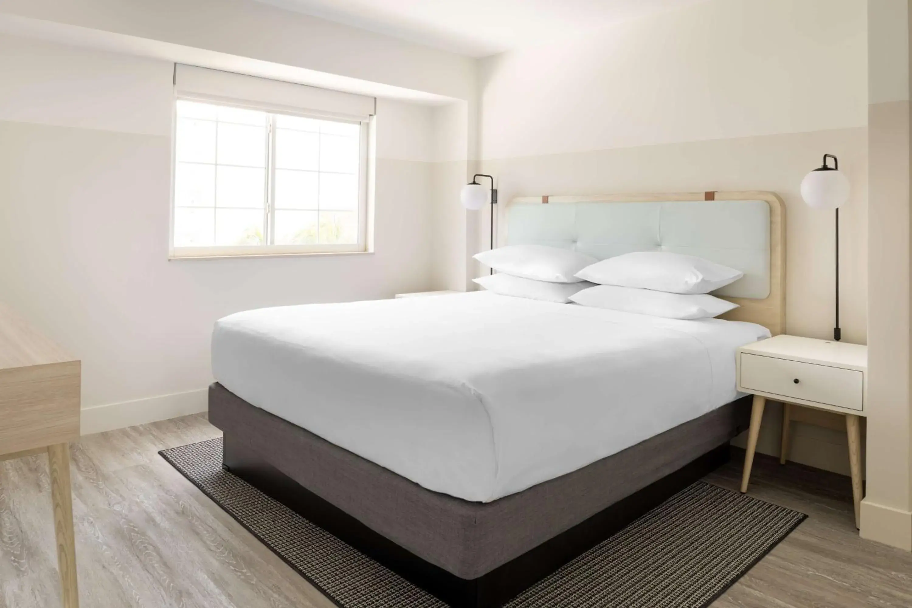 Standard King Room with Partial Ocean View in Hampton by Hilton Grand Cayman Seven Mile Beach Standard King Room with Partial Ocean View in Hampton by Hilton Grand Cayman Seven Mile Beach