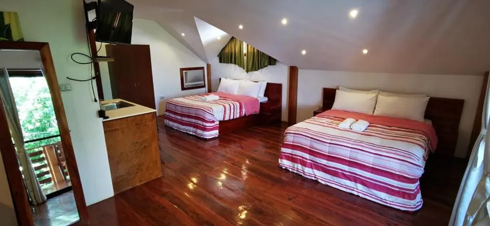 Bed in Descanso En Paraiso Resort