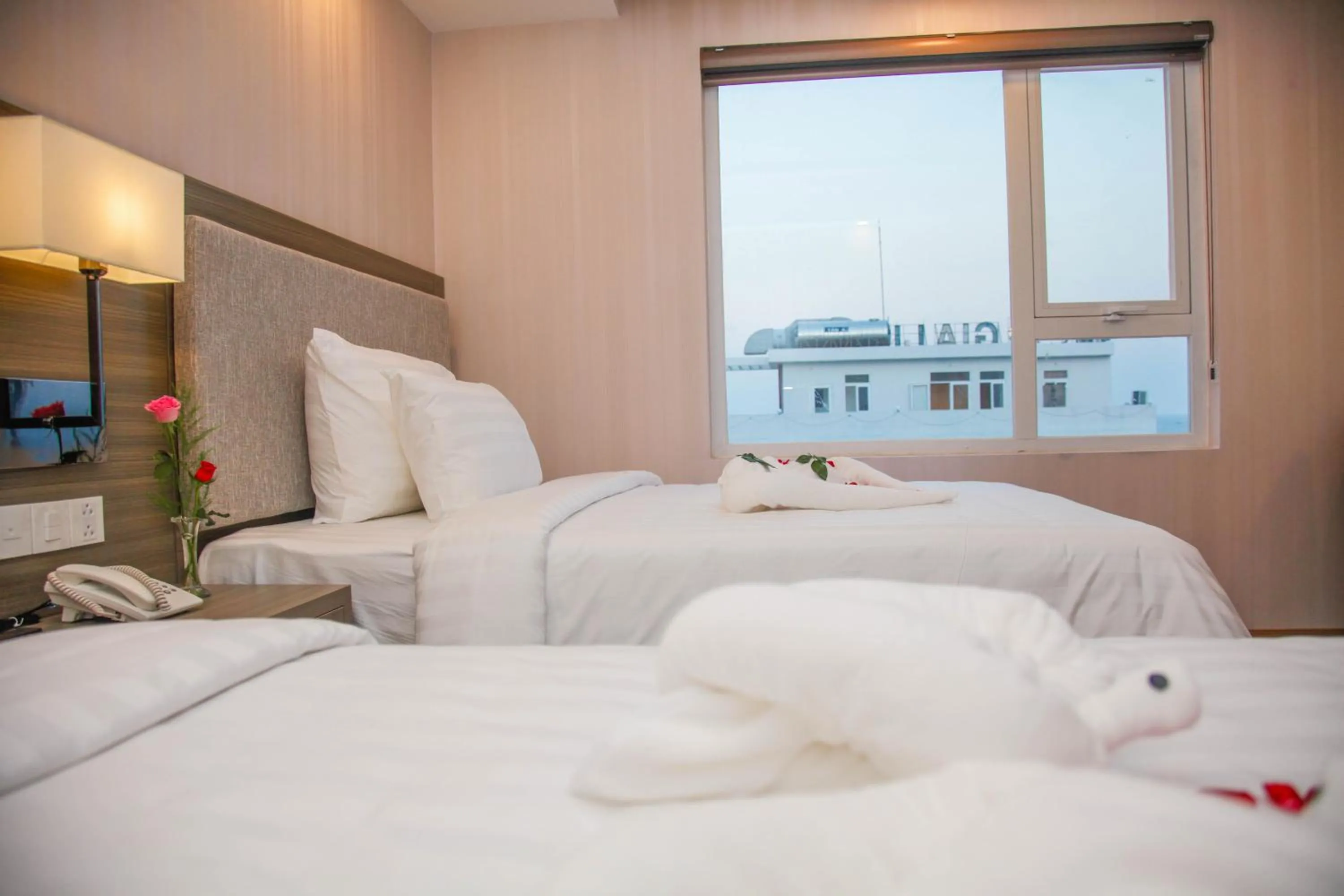 Bed in Golden Rose Hotel