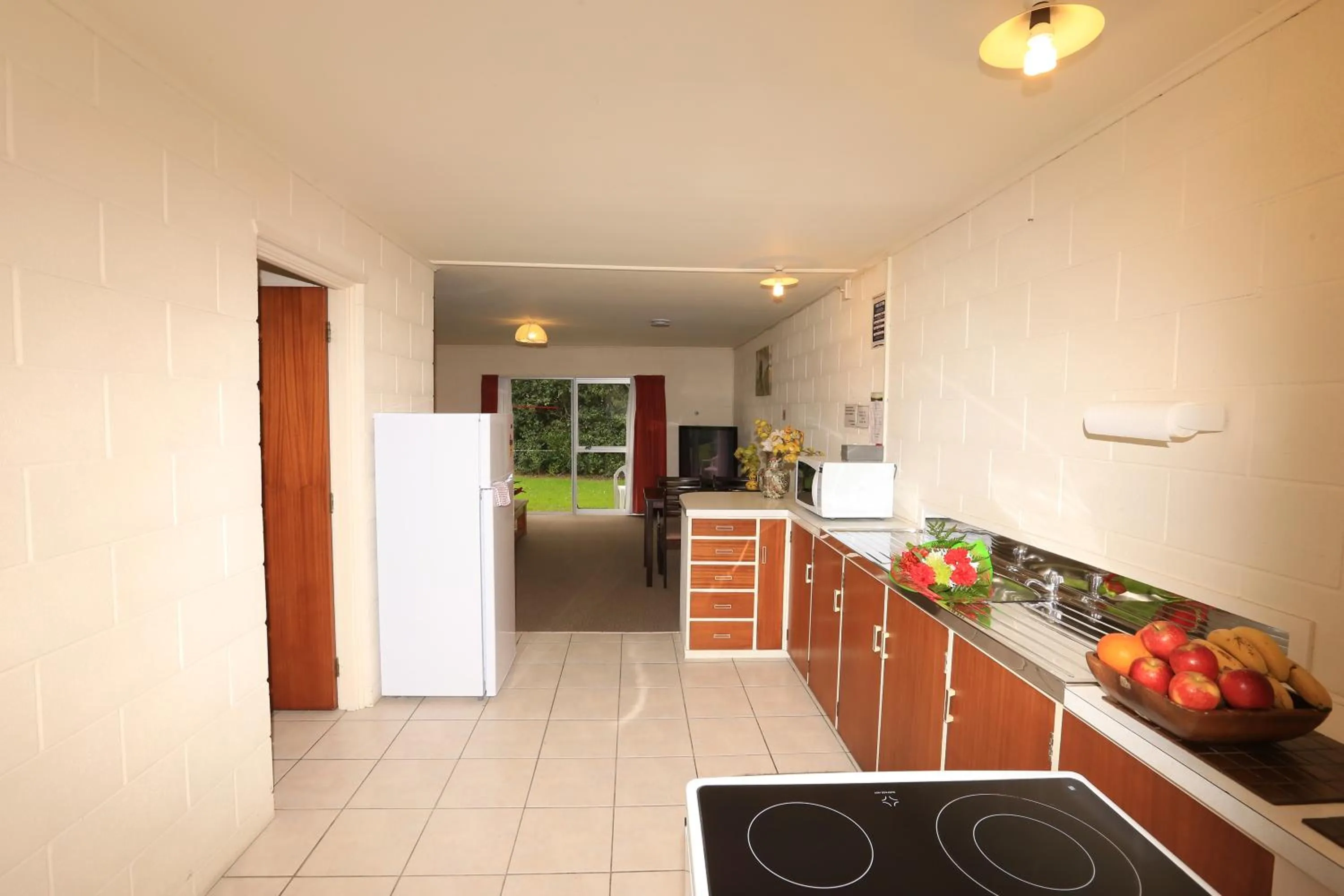 Kitchen or kitchenette in Waiuku Motel
