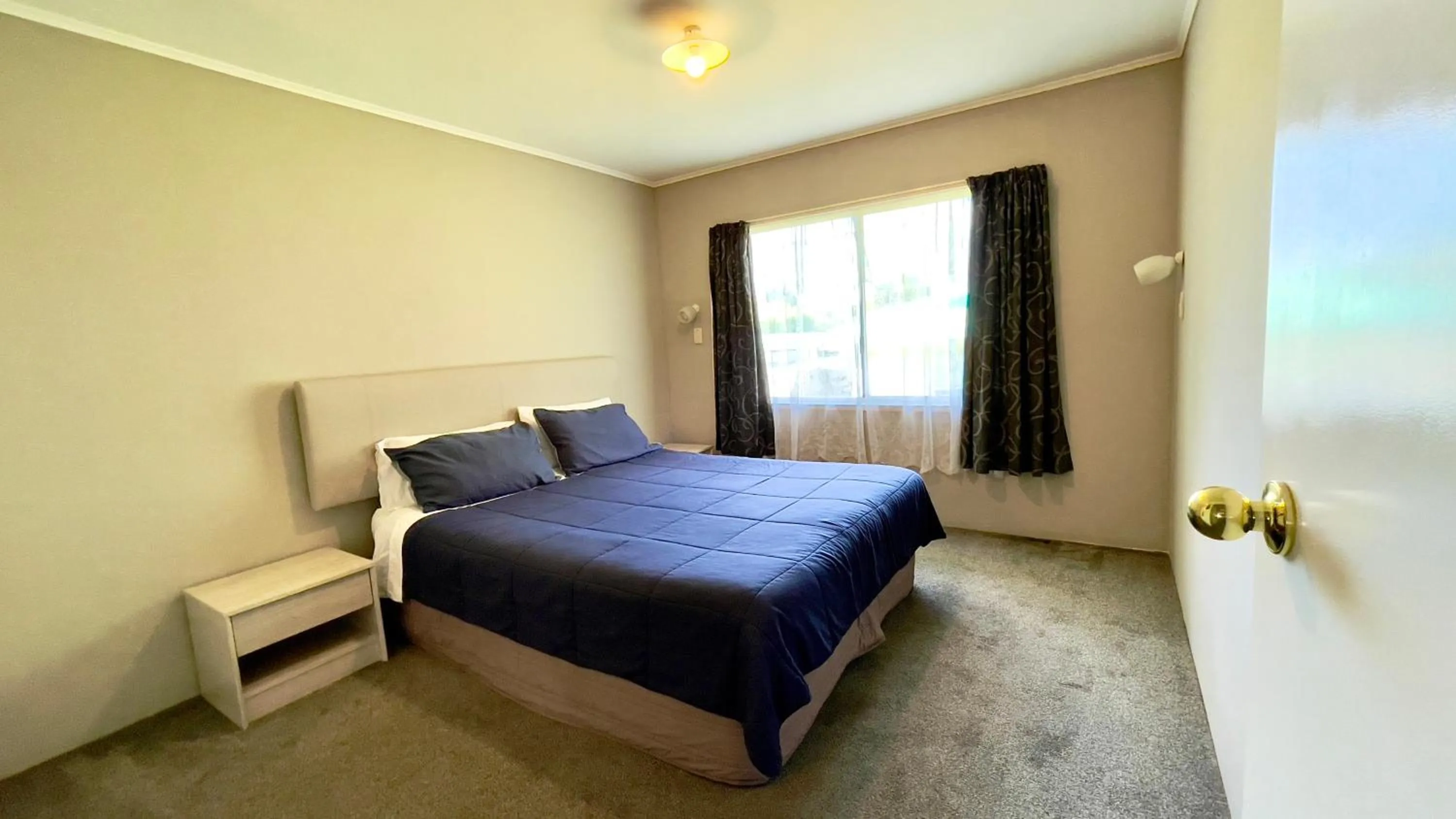 Bed in Waiuku Motel