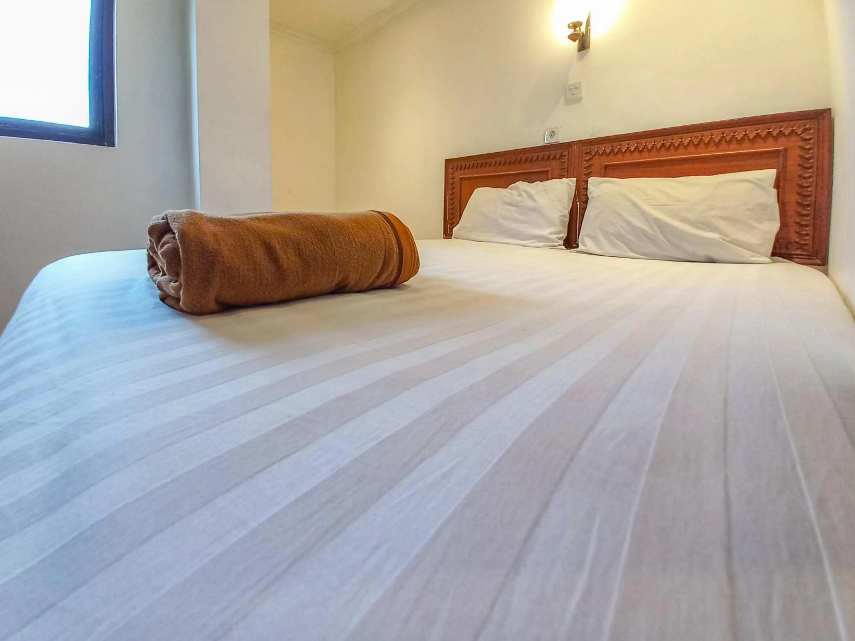 Bedroom, Bed in D Hans Hotel Syariah RedPartner near Wisata Religi Sunan Ampel Surabaya