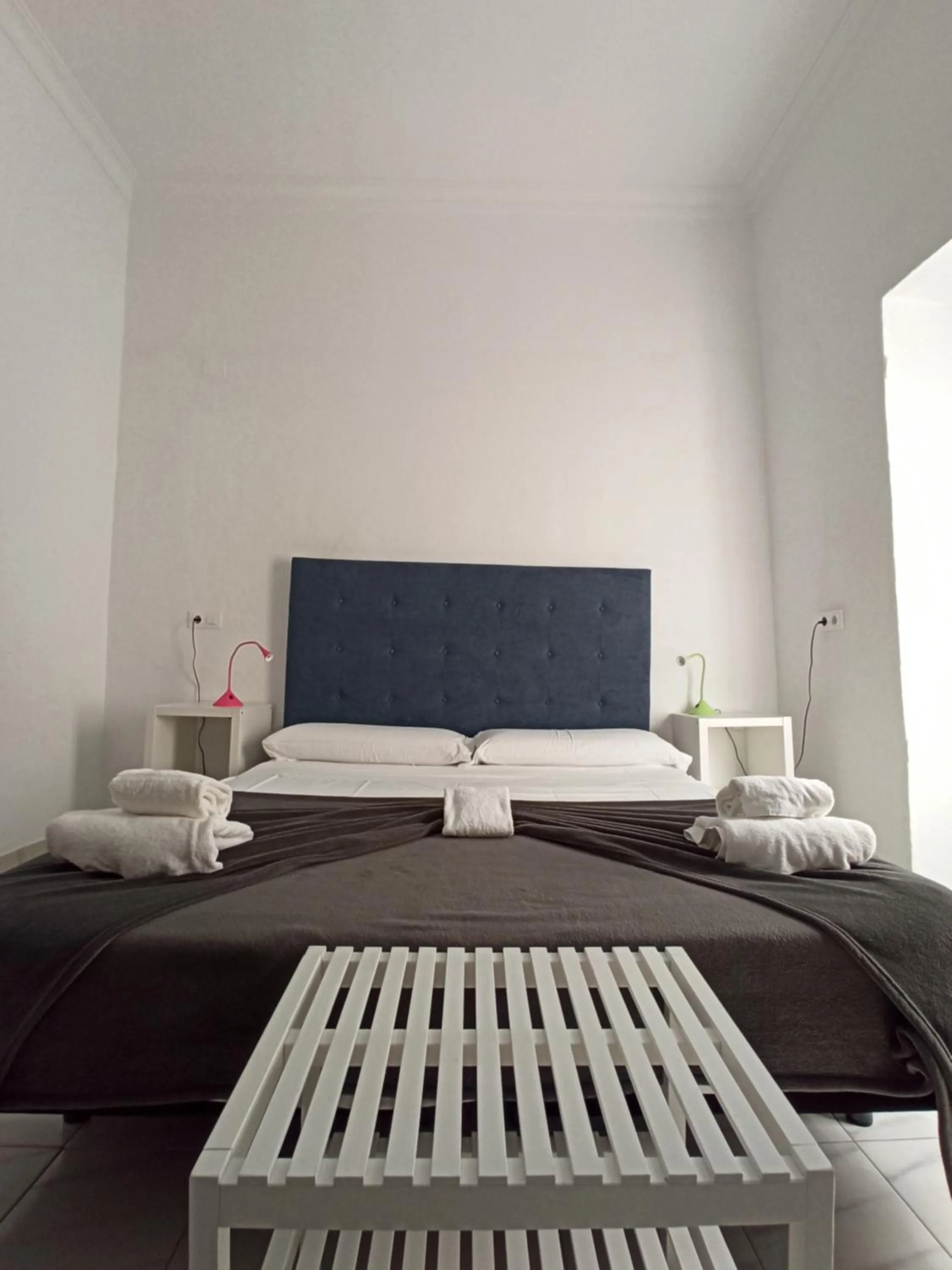 Bed in Vivian's Guest House Auto Check-in