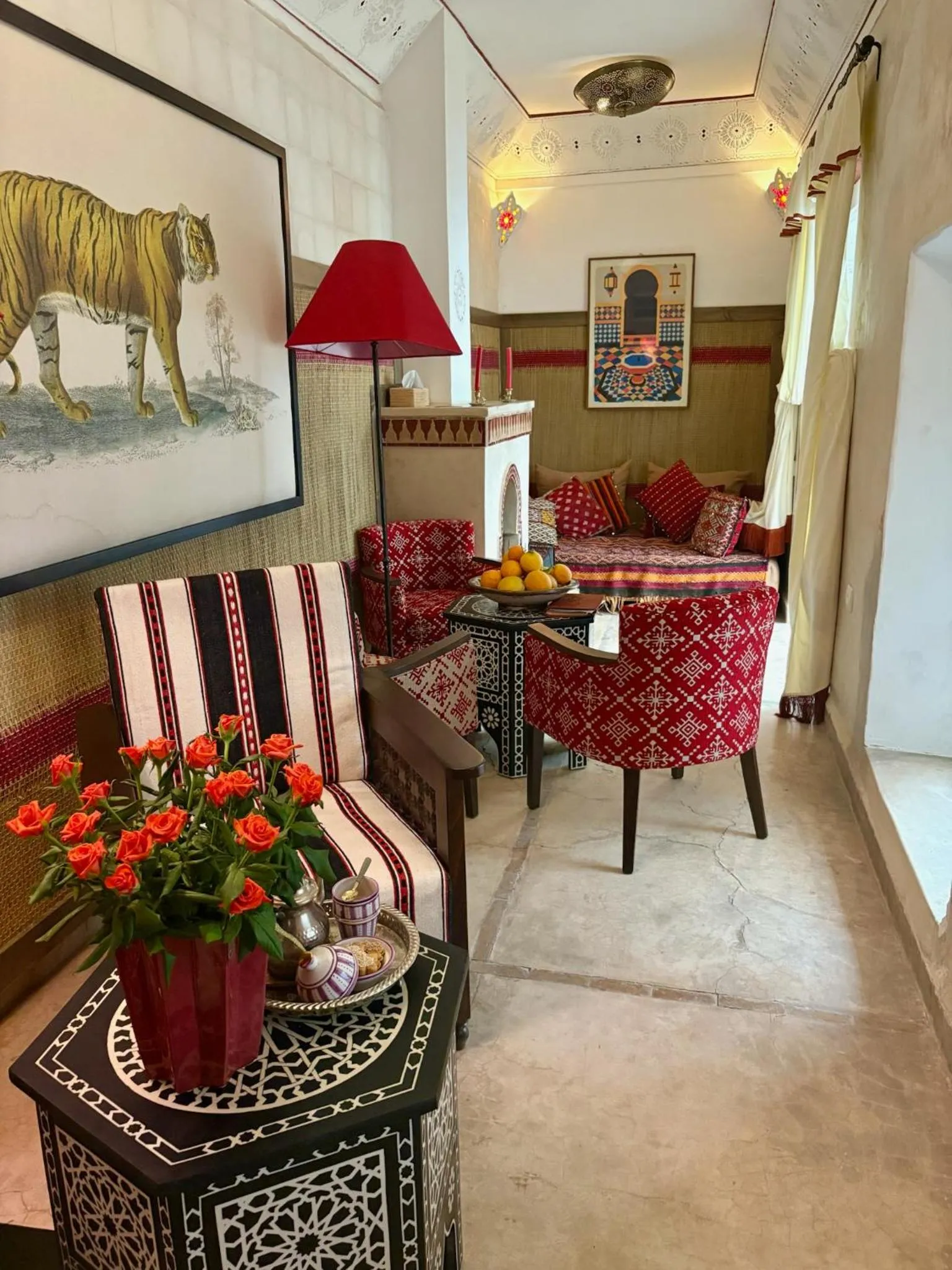 Communal lounge/ TV room in Riad la Cigale