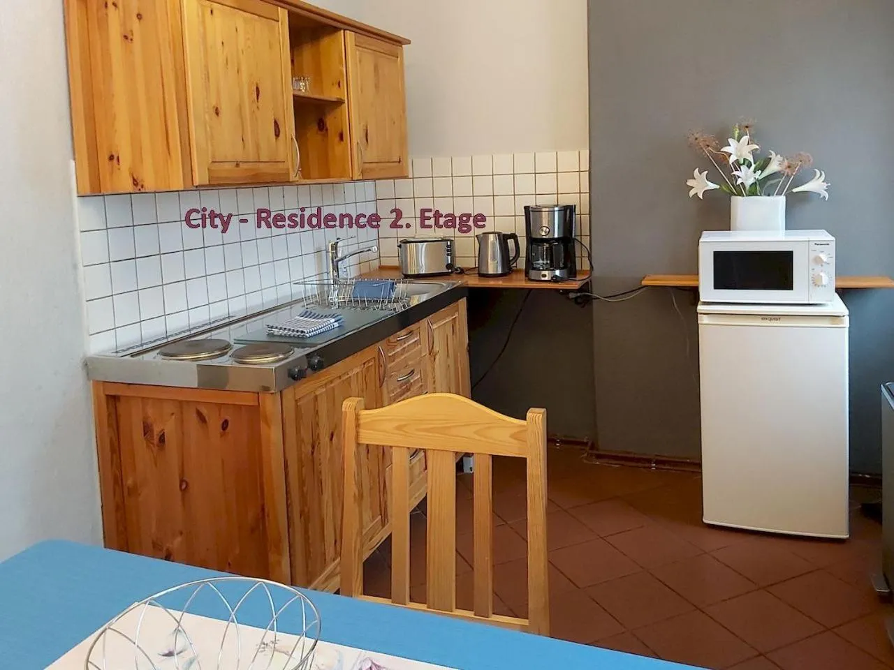 Kitchen or kitchenette in City-Ferienwohnungen-Dresden - zentral gelegen im Haus Louisenstrasse 11 - Dresden-Neustadt