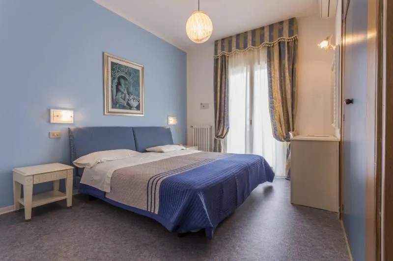 Bedroom in Golf & Beach Hotel