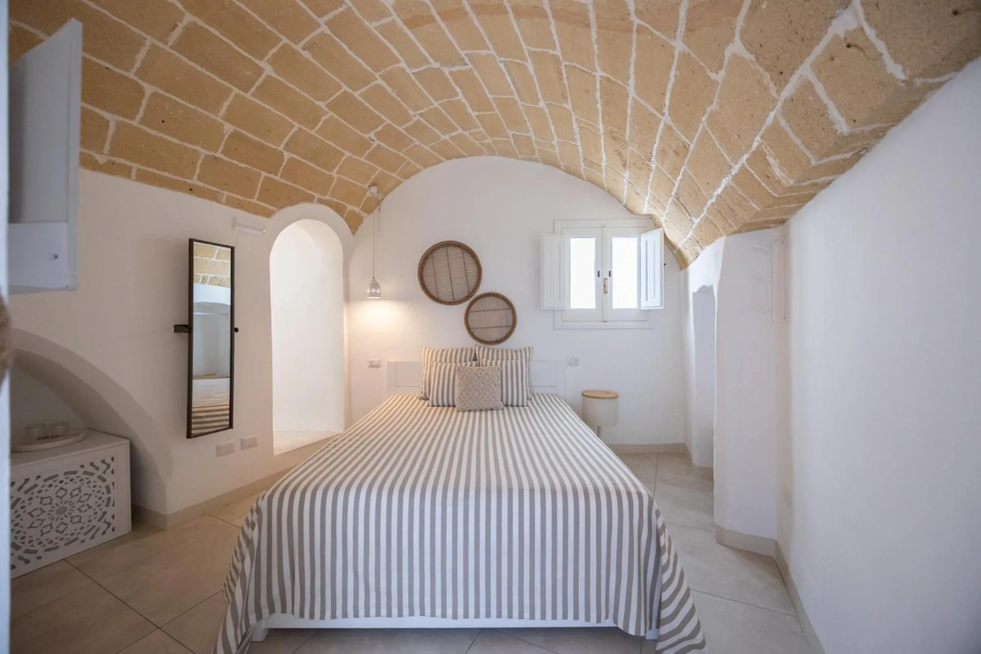 Bed in Palmieri Luxury Rooms