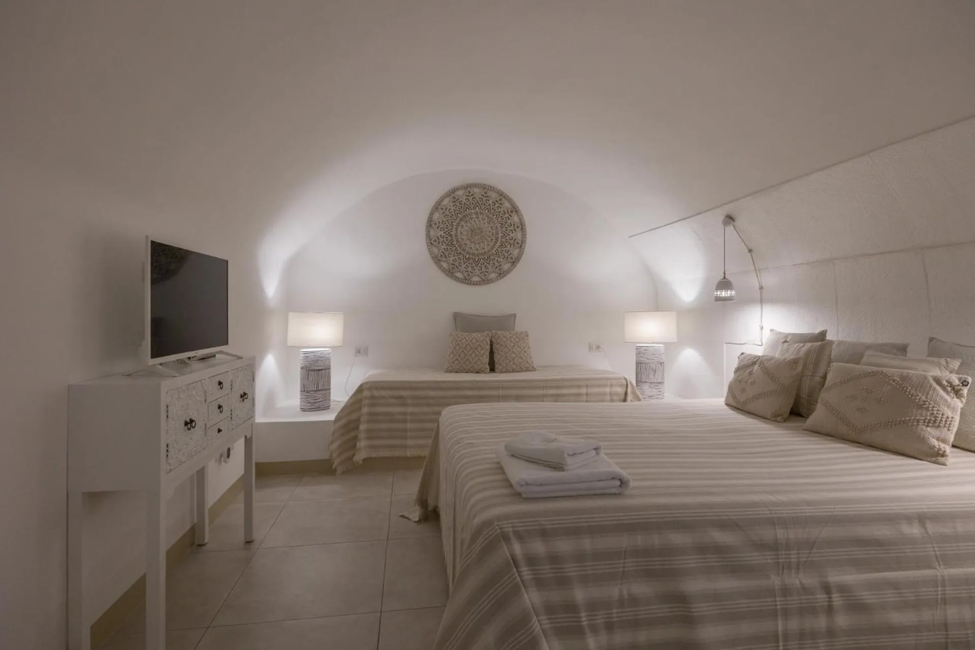 Bed in Palmieri Luxury Rooms