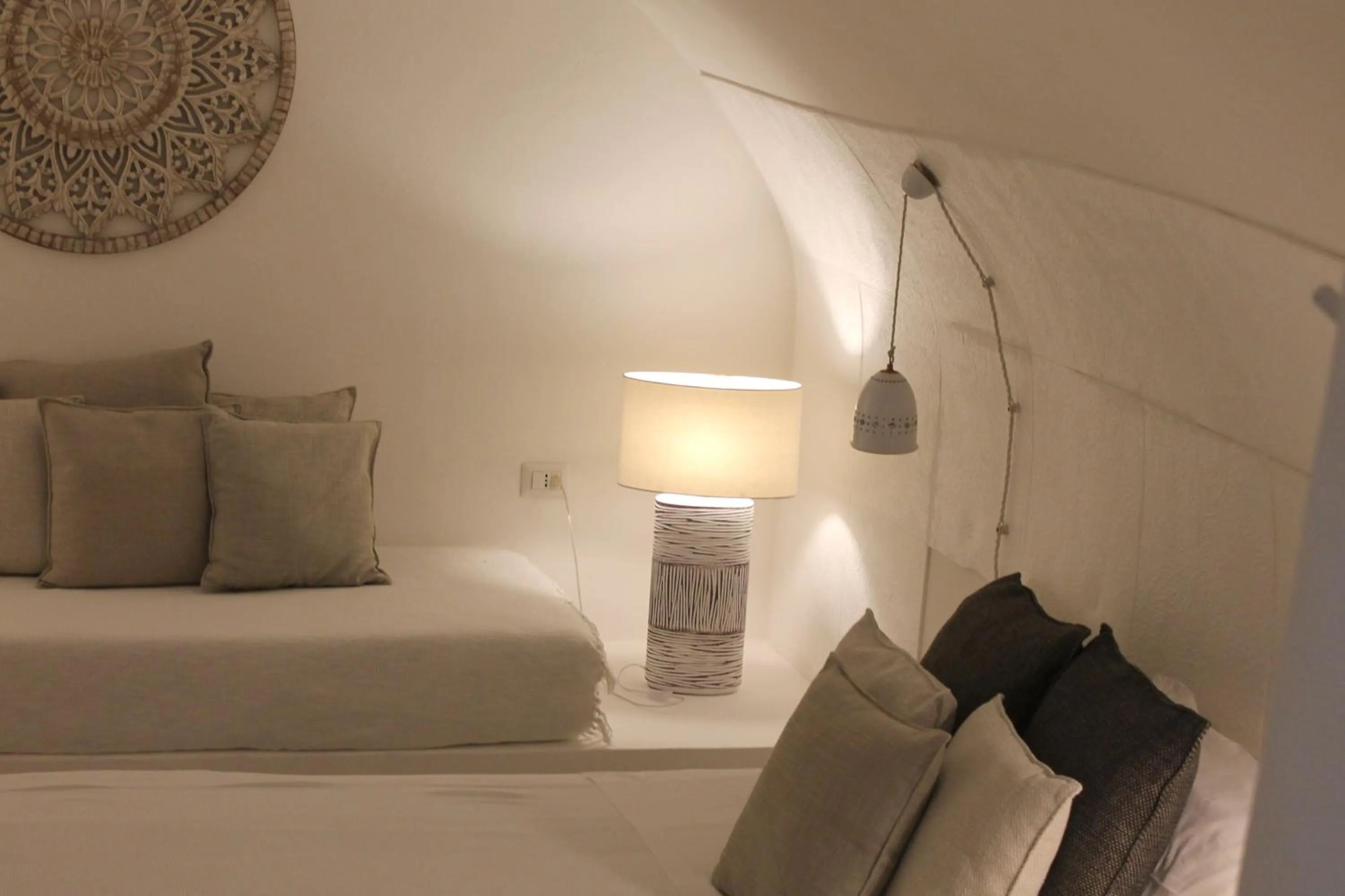 Bed in Palmieri Luxury Rooms