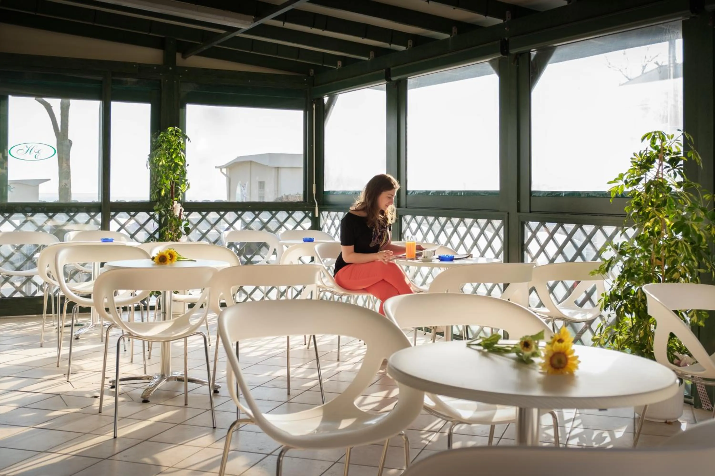 Communal lounge/ TV room in Hotel Emilia