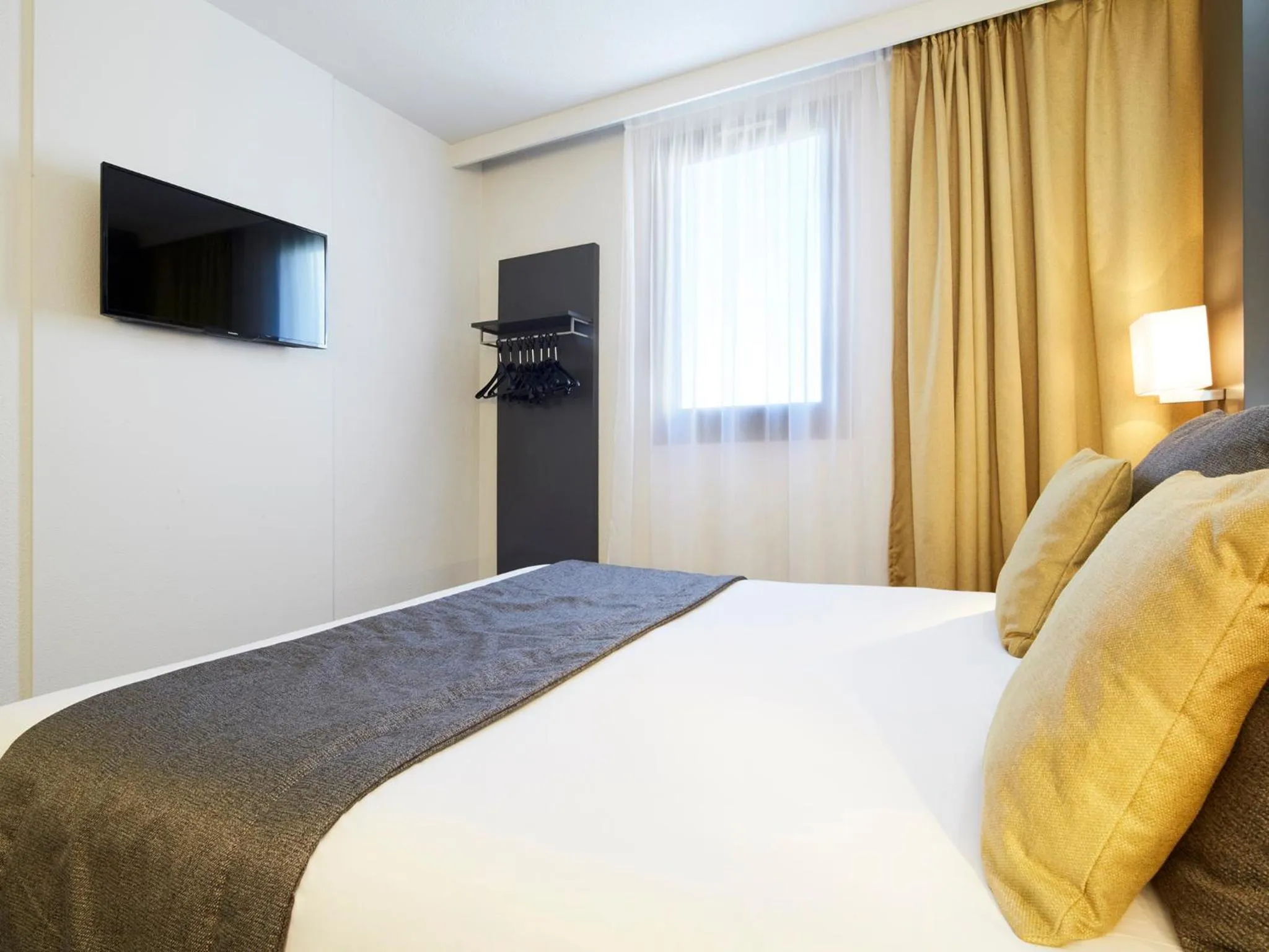 Bedroom, Bed in Kyriad Paris Ouest - Bezons La Défense