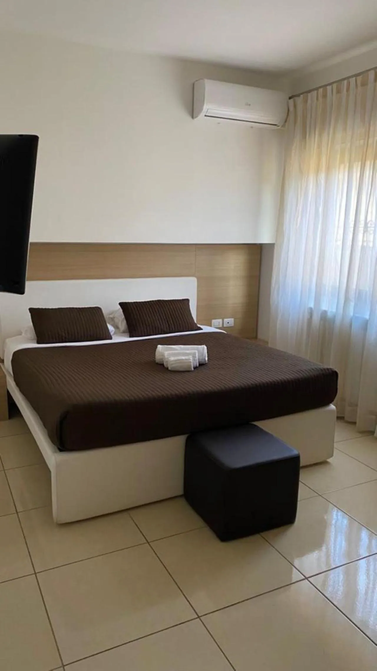 Bed in San Michele Apartments&Rooms