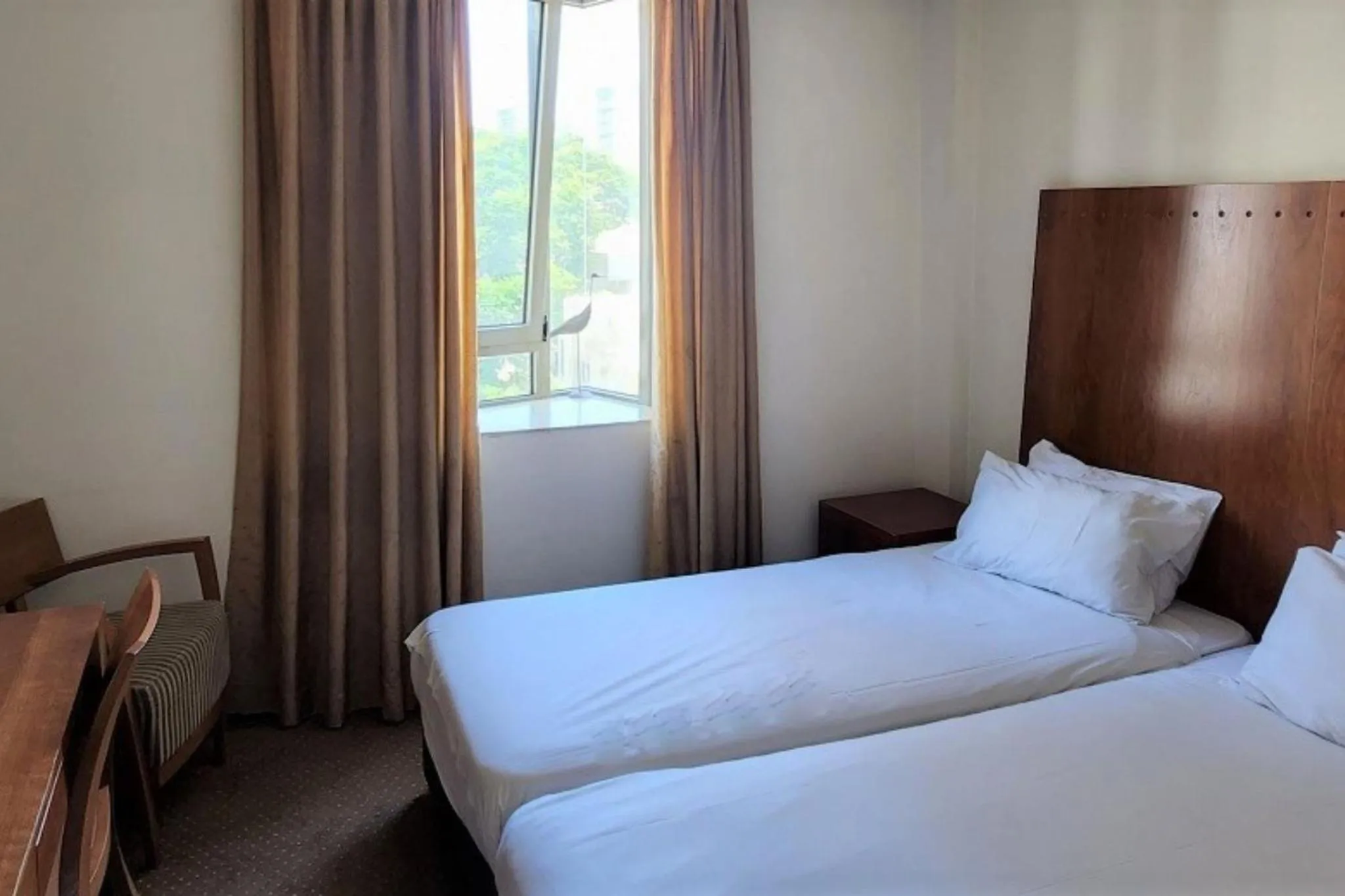 Bed in SeaNet Hotel By AFI Hotels