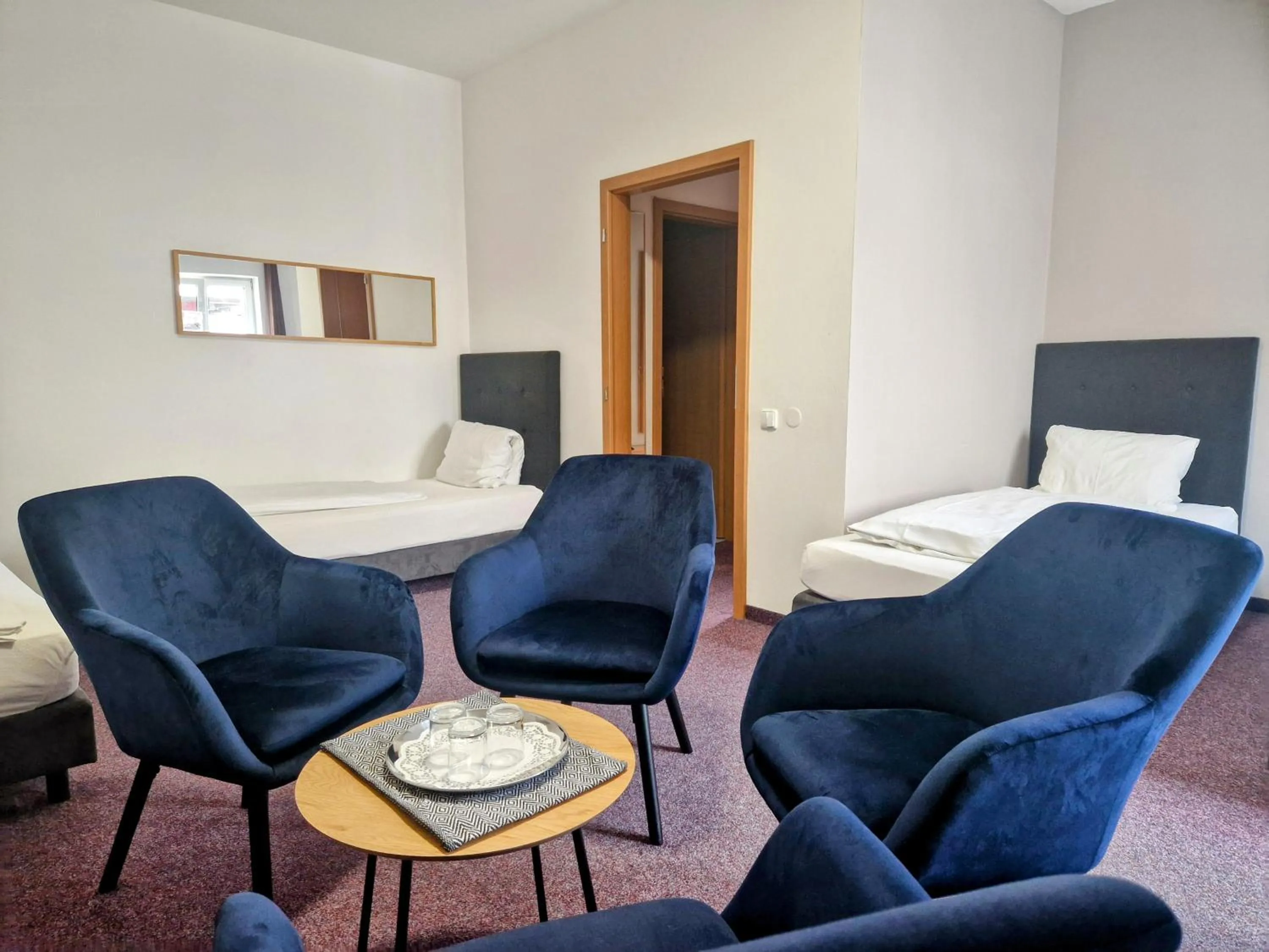 Bed in Family hotel Maxim