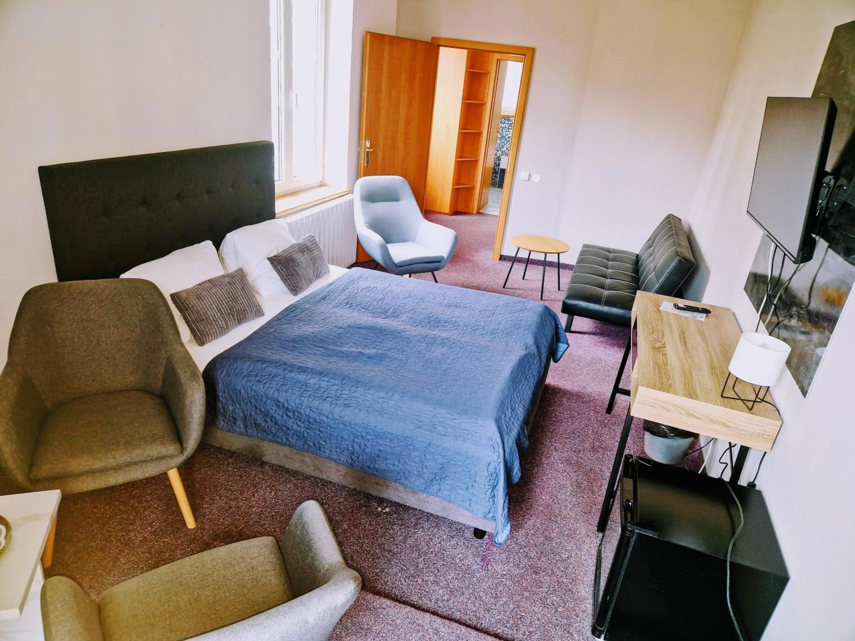 Bed in Family hotel Maxim